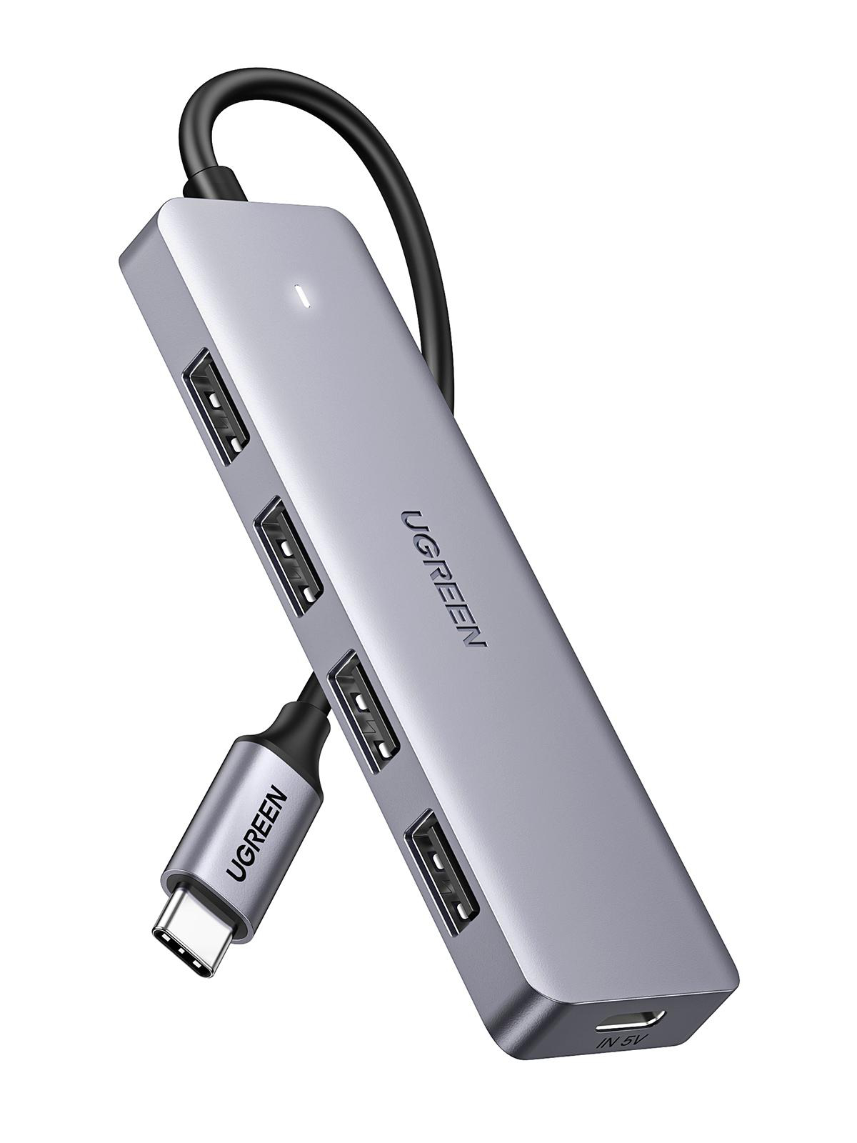 Grauer USB-C-Hub mit vier USB-Anschlüssen und UGREEN-Logo.