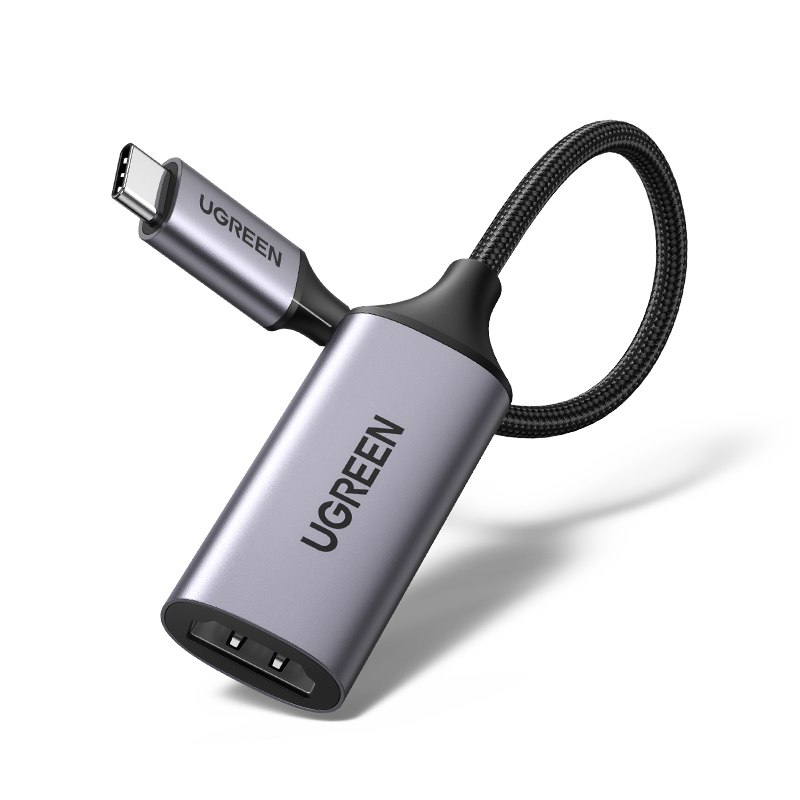 Ein grauer UGREEN USB-C-zu-HDMI-Adapter mit schwarzem Kabel.