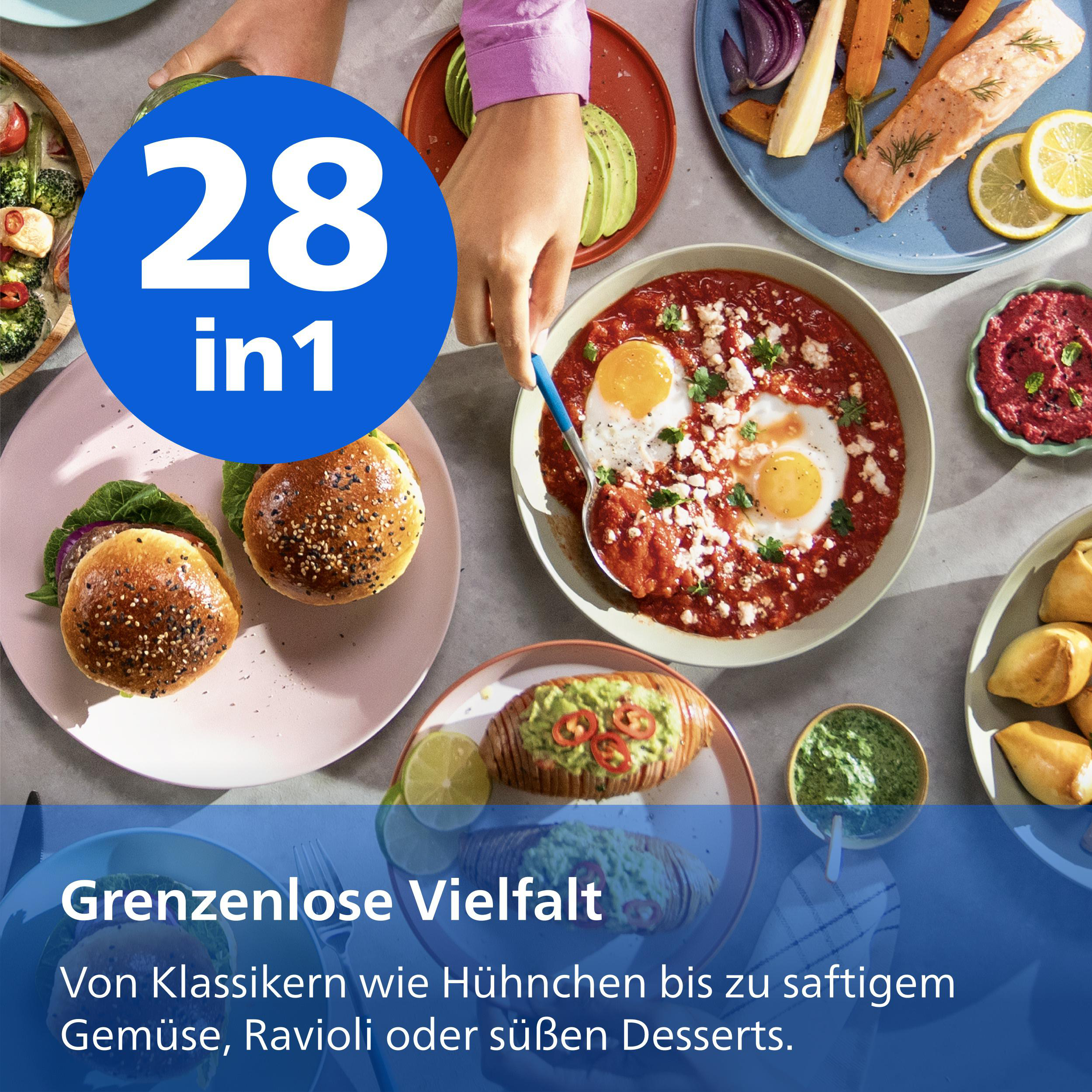 Tafel mit vielen Gerichten: Lachs, Burger, Shakshuka, gefüllter Kartoffel.