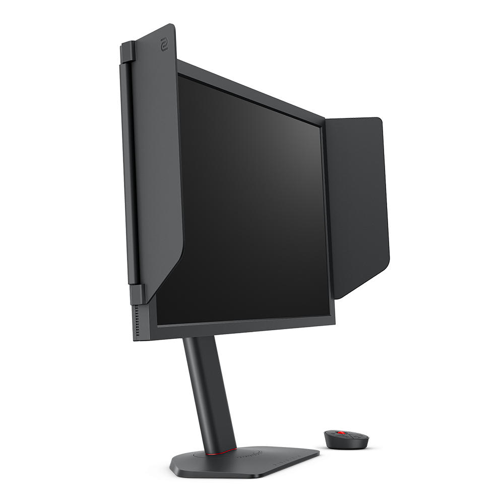 Ein schwarzer Monitor mit Sichtblenden und einem kleinen schwarzen Controller davor.