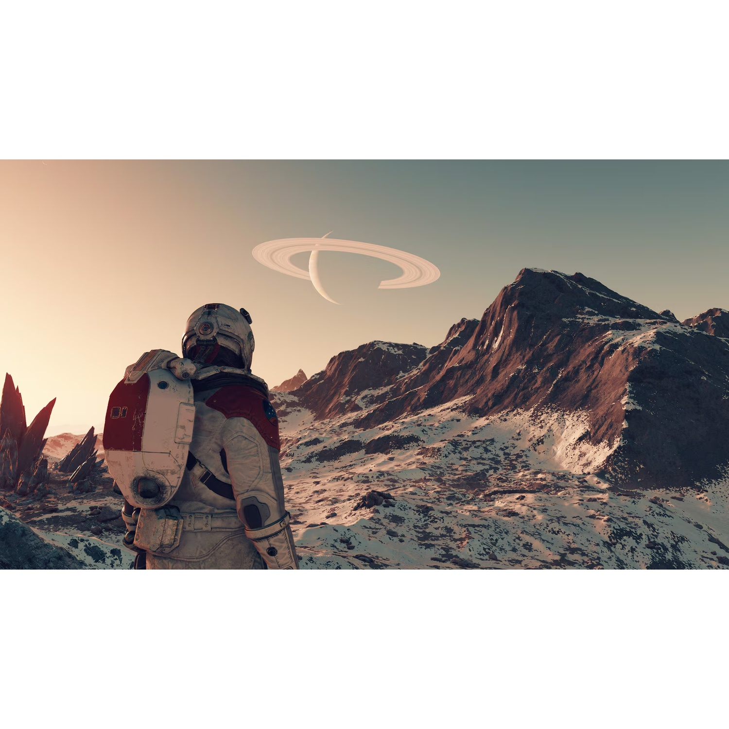 Un astronaute regarde un monde montagneux enneigé avec une planète annelée dans le ciel.