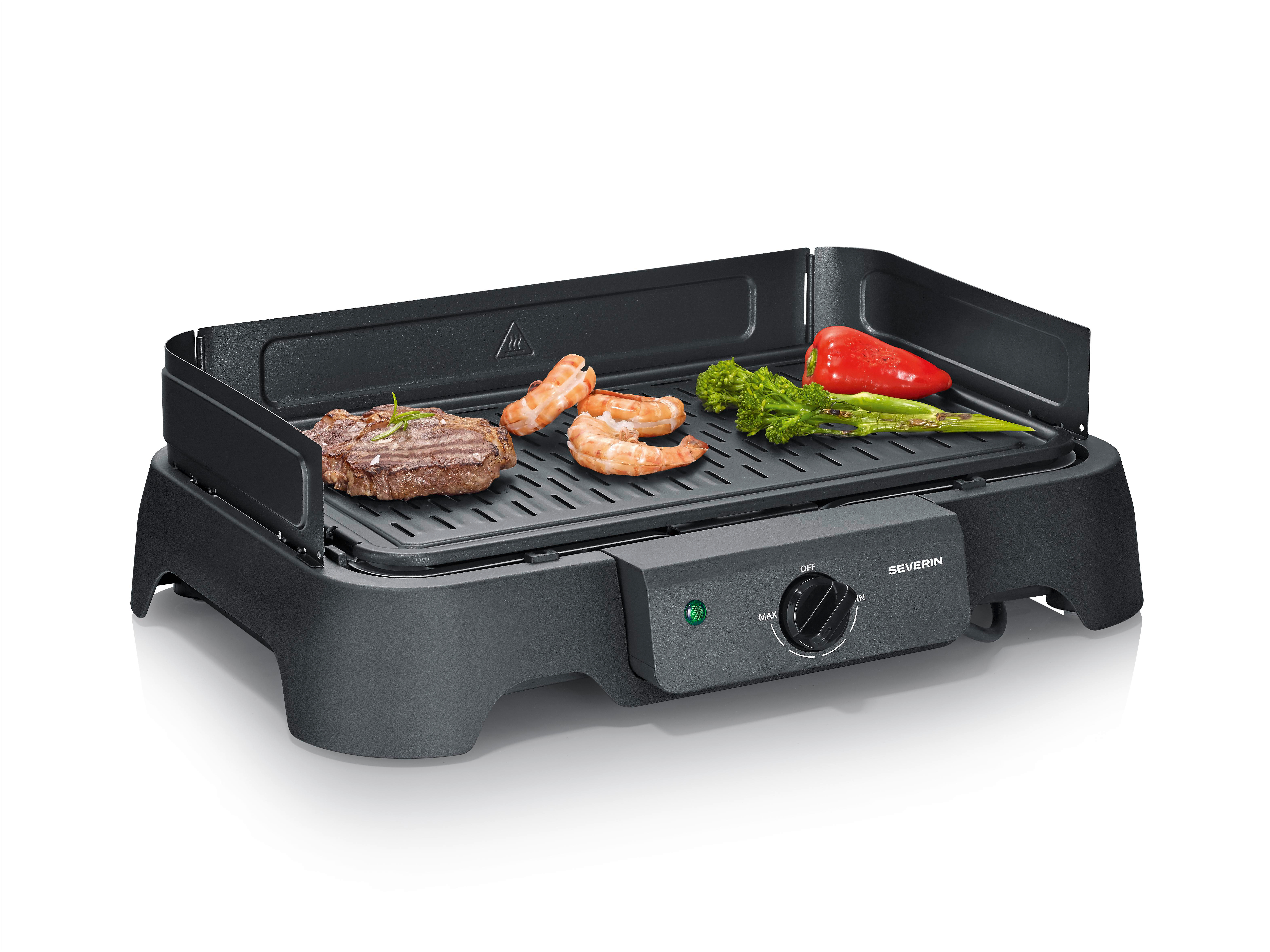 Elektrogrill mit Steak, Garnelen, Brokkoli und Paprika