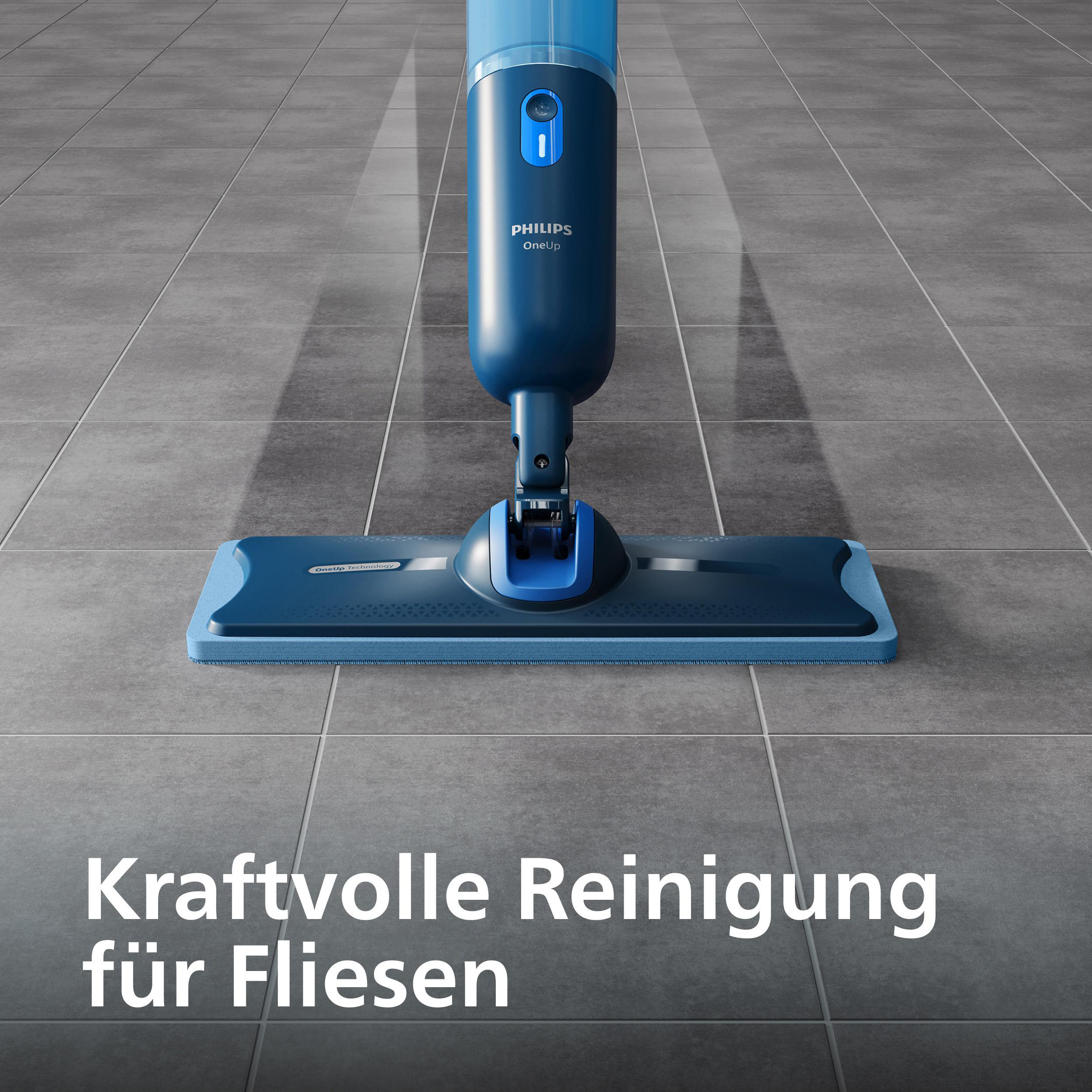Ein blauer Dampfreiniger reinigt graue Fliesen. Starker Reinigungseffekt.