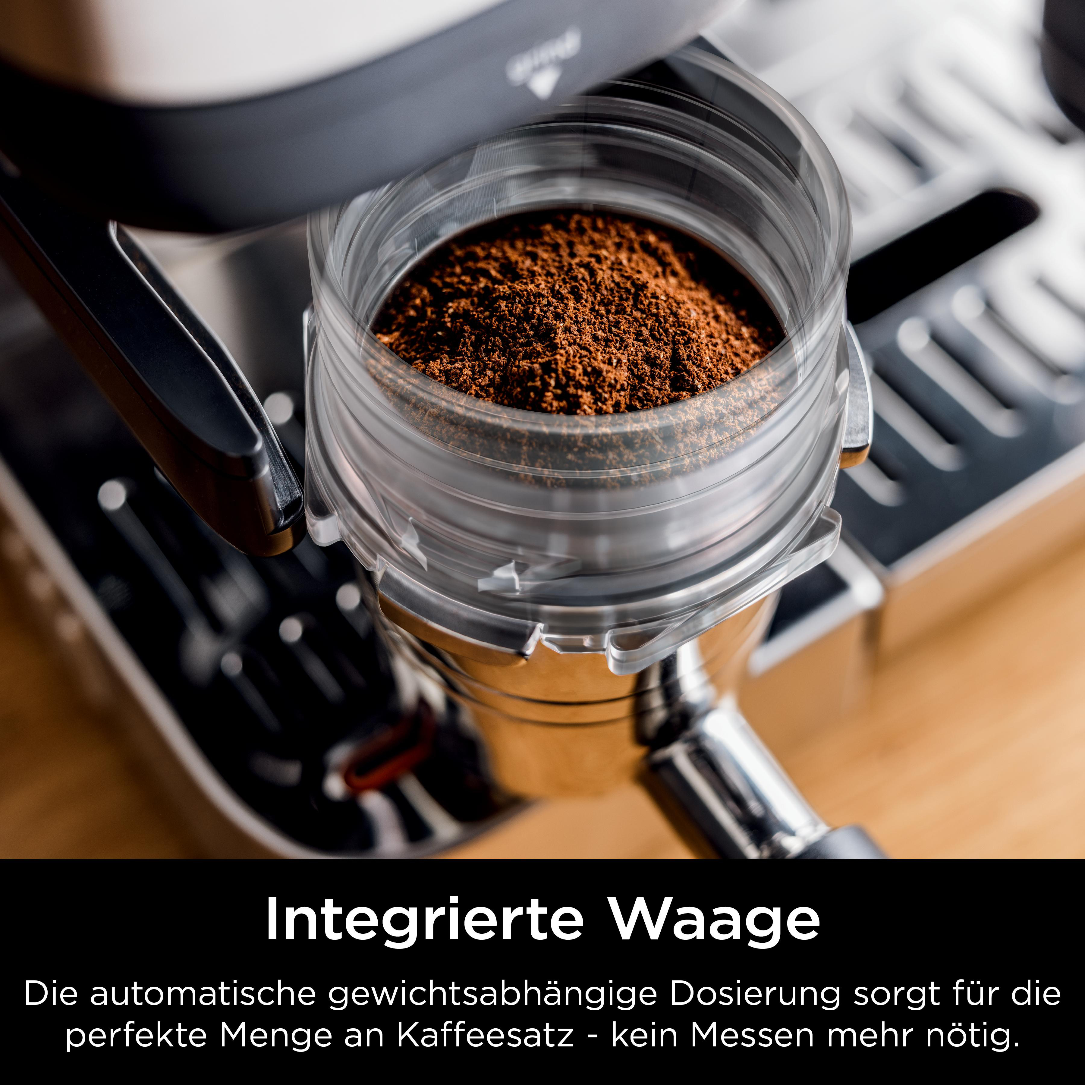 Kaffeemühle mit integrierter Waage und Kaffeepulver.