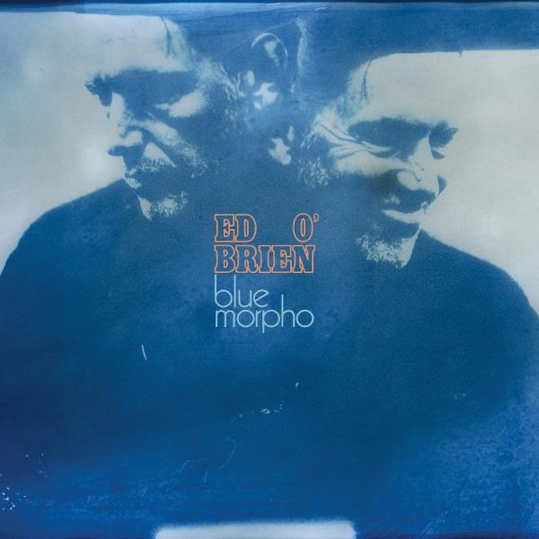 Zwei Männergesichter im Schatten, mit Text "Ed O'Brien blue morpho".