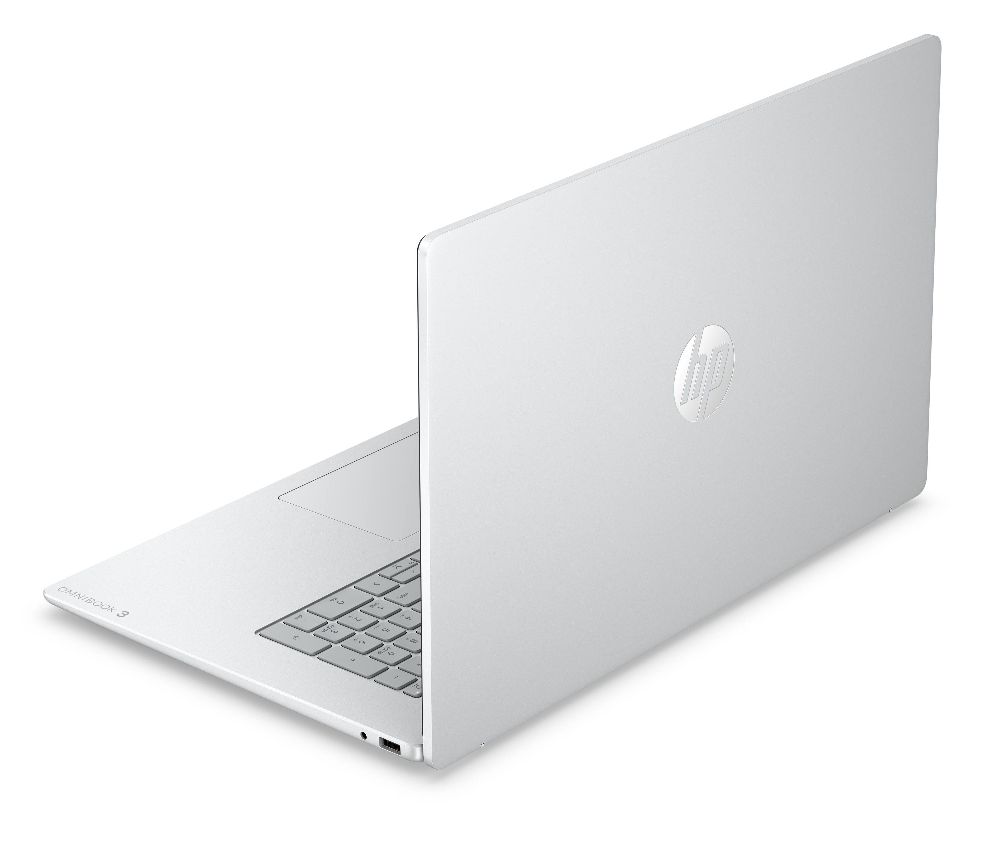Ein weißer HP Omnibook 3 Laptop, von schräg oben mit Tastatur und HP-Logo.