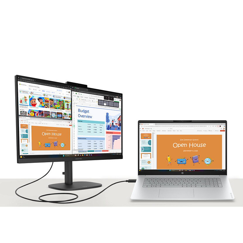 Ein Laptop und ein Monitor mit Präsentationen über Budgetübersicht und "Open House".