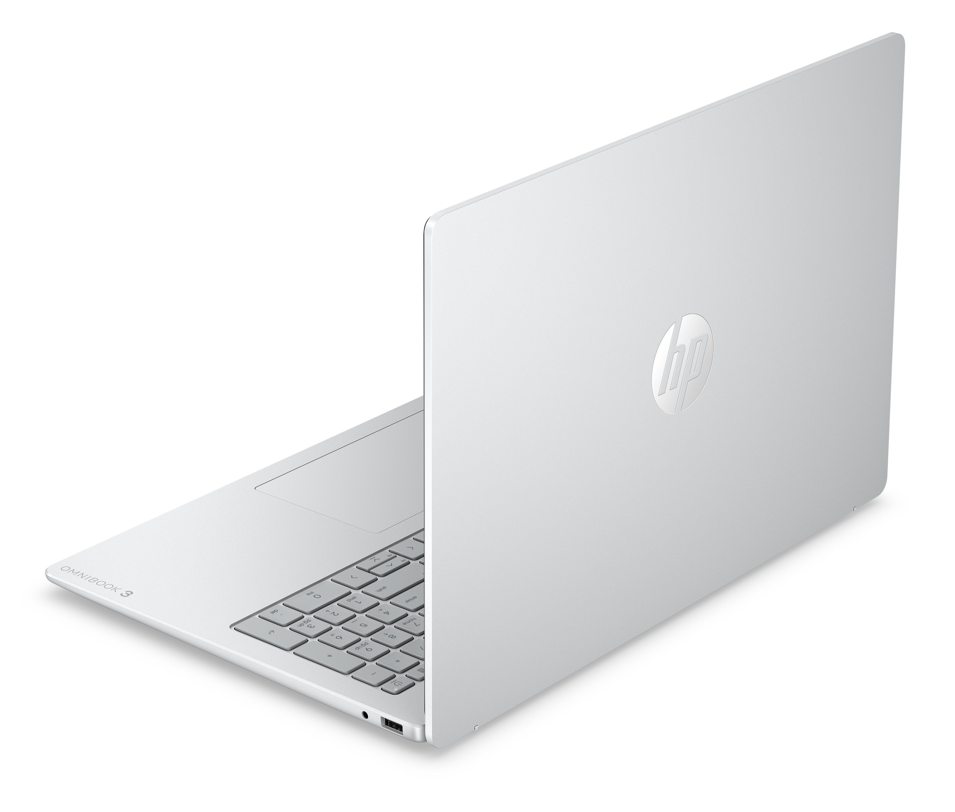 Ein weißer HP Omnibook 3 Laptop ist auf schwarzem Hintergrund zu sehen.