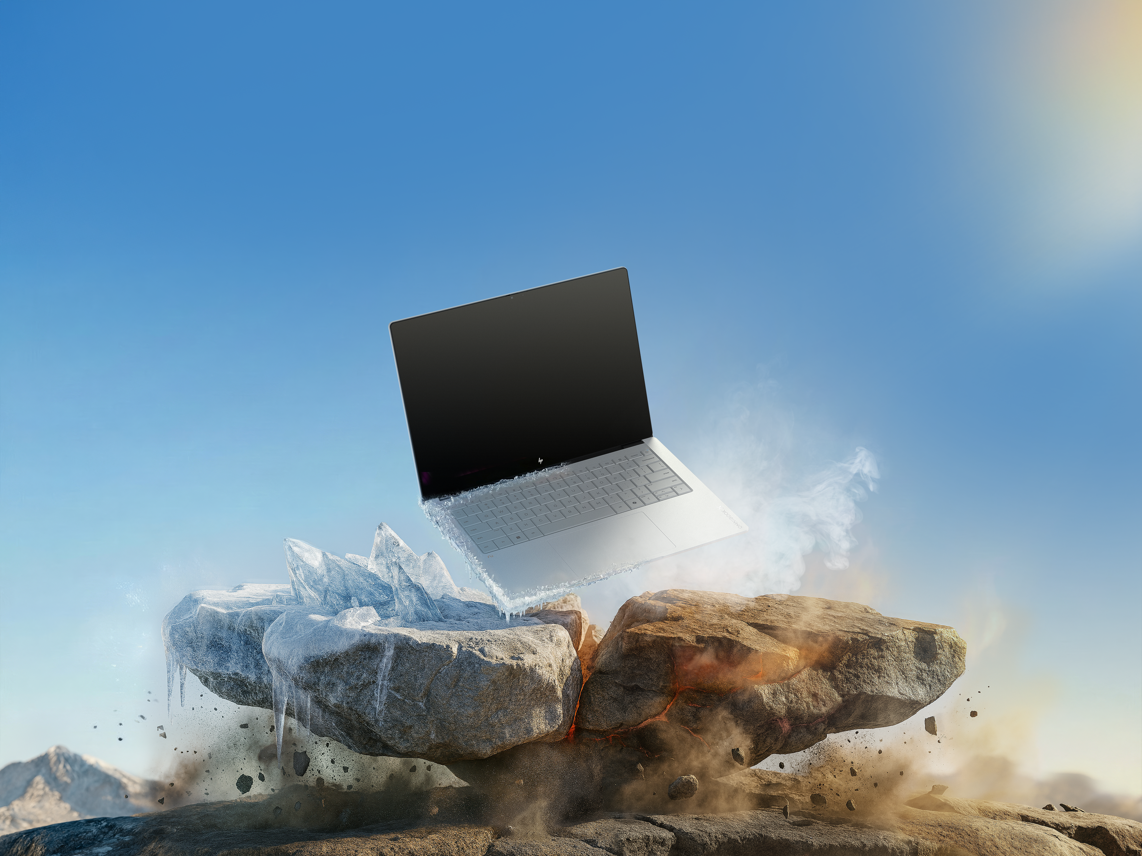 Laptop unosi się nad poszarpanymi skałami, częściowo zamarzniętymi, częściowo żarzącymi się.