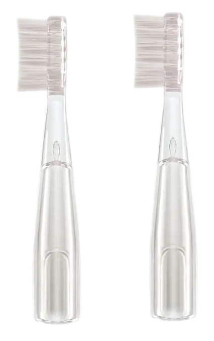 Dwie przezroczyste główki szczoteczki do zębów obok siebie na czarnym tle.