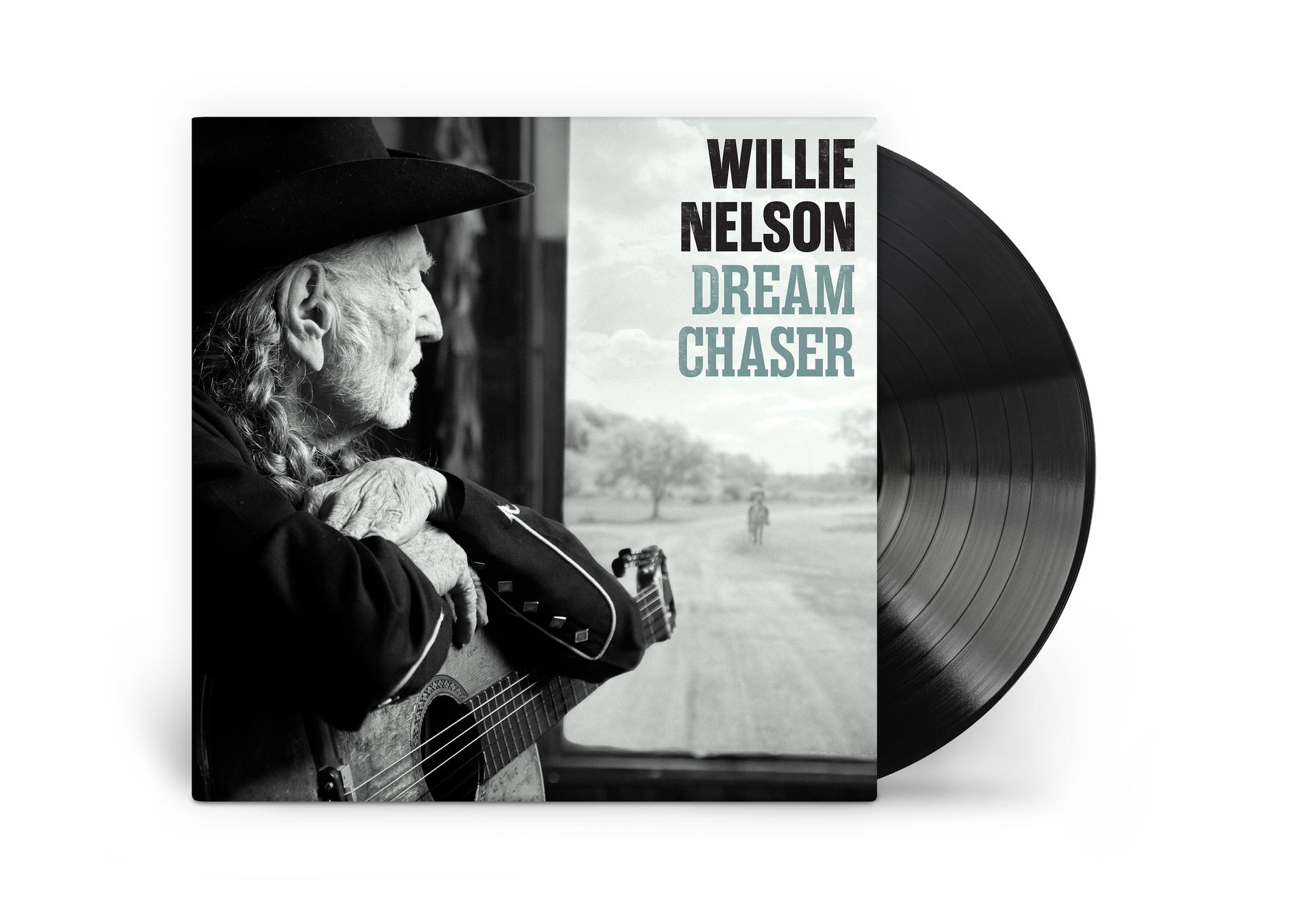 Willie Nelson mit Gitarre, blickt nach rechts. Vinyl daneben.