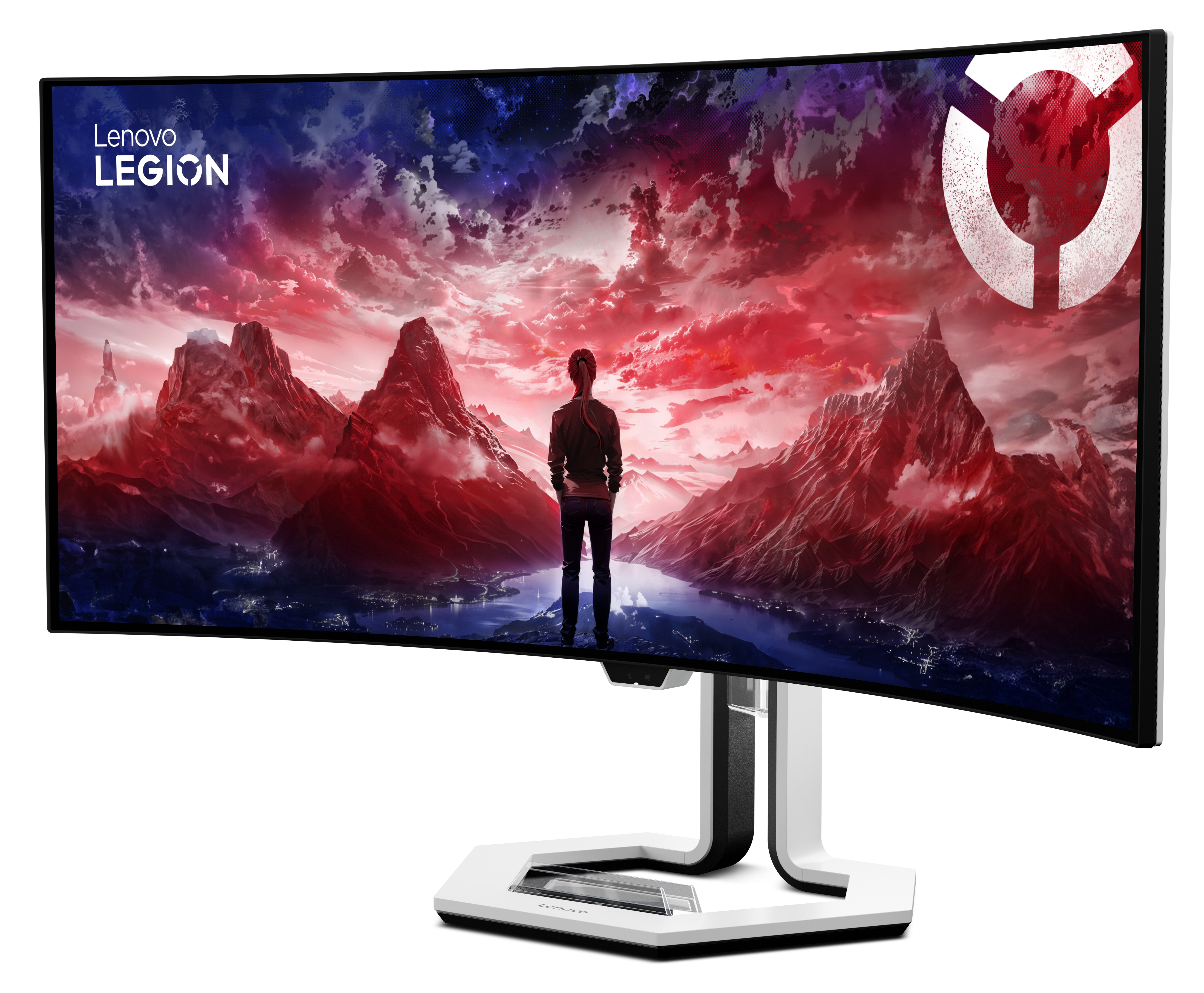 Mężczyzna przed zakrzywionym ekranem z krajobrazem górskim. Logo Lenovo.