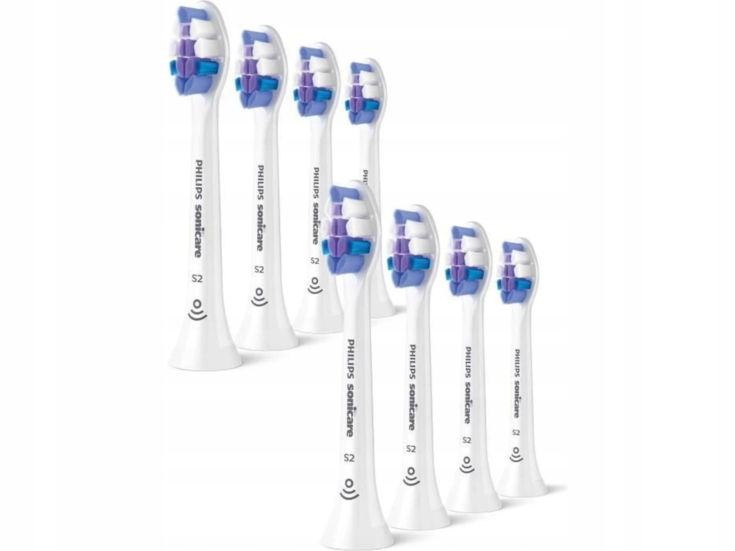 Siedem białych końcówek do szczoteczki Philips Sonicare z niebieskimi i fioletowymi włoskami.