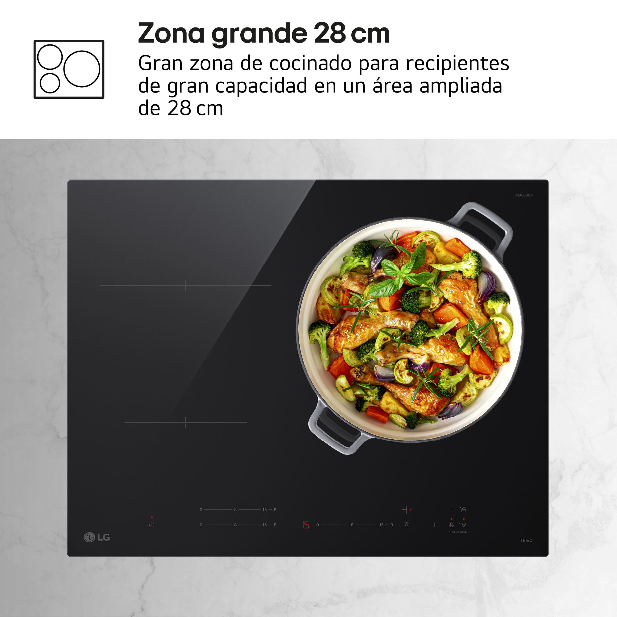 Encimera de inducción negra con una olla de verduras asadas y pollo.