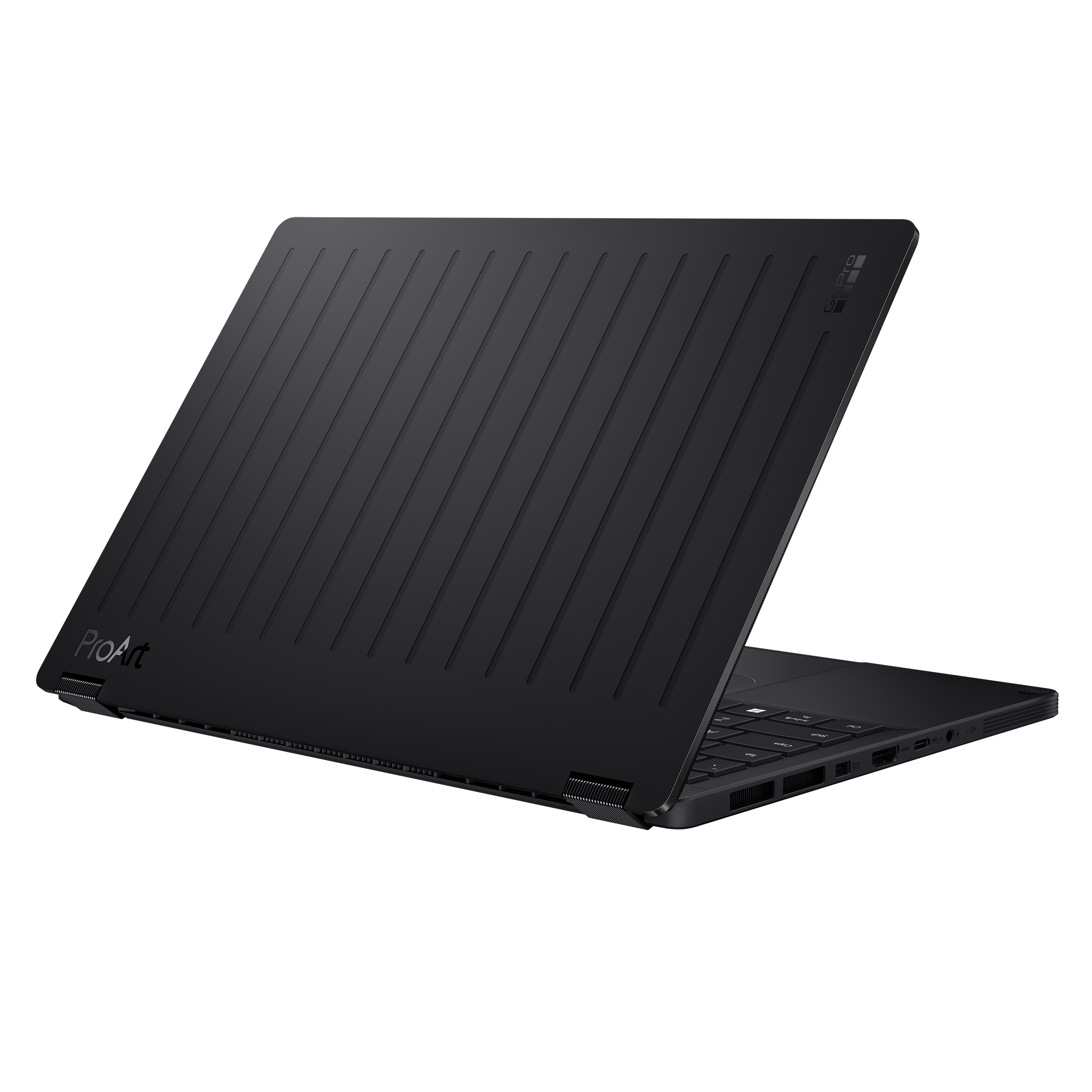 Schwarzer Laptop mit geriffeltem Deckel und "ProArt"-Logo, auf schwarzem Hintergrund.