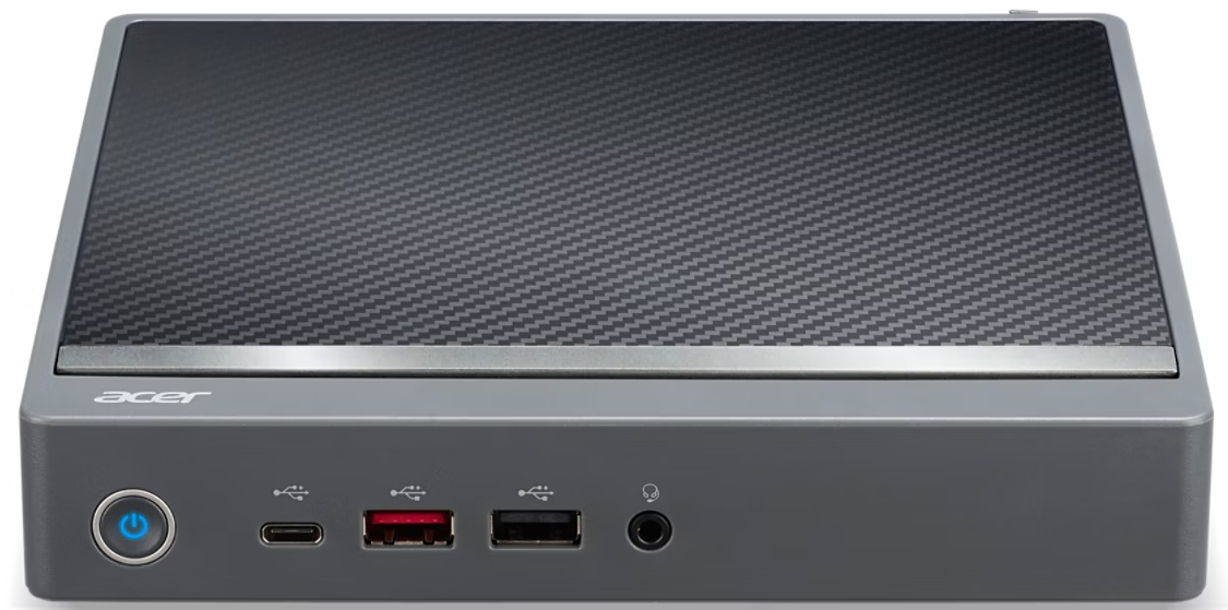 Szürke Acer mini PC szénszálas fedlappal, bekapcsológombbal és portokkal.
