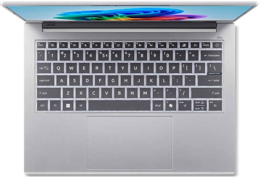 Ezüst laptop nyitott fedéllel, színes képernyővel, felülnézetből.