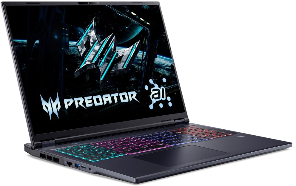 Egy nyitott, sötét laptop világító billentyűzettel és Predator logóval a képernyőn.