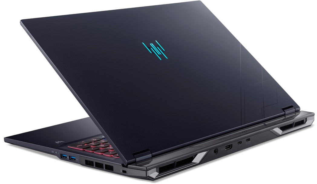 Sötétkék laptop világoskék logóval és piros billentyűzettel.