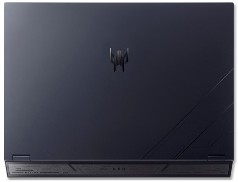 Sötétkék laptop ezüst logóval és vonalakkal.