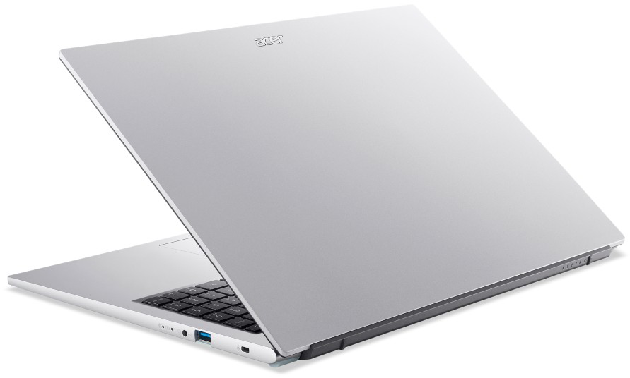 Egy ezüst Acer laptop, nyitott állapotban, hátulról ferdén nézve. Billentyűzet látható.