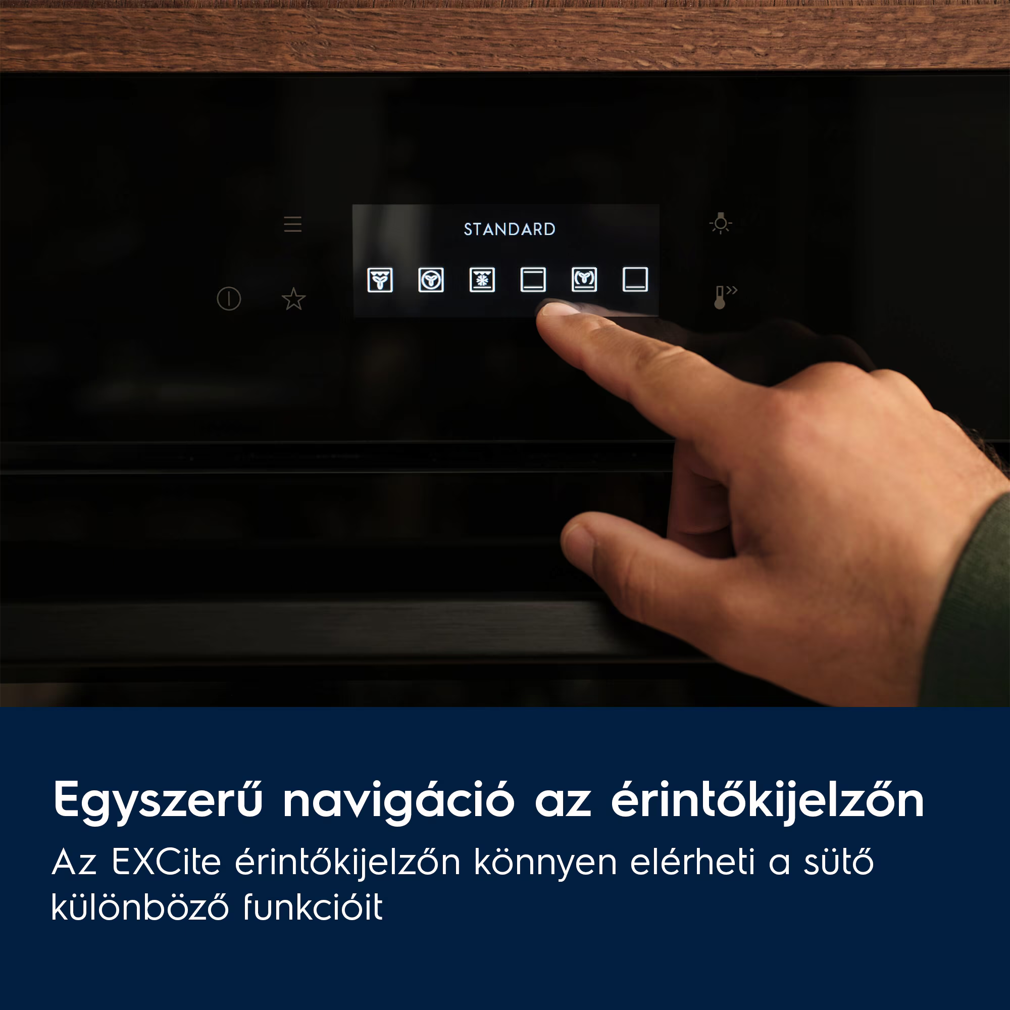 Egy ujj érint meg egy ikonokkal ellátott sütő vezérlőpanelt.