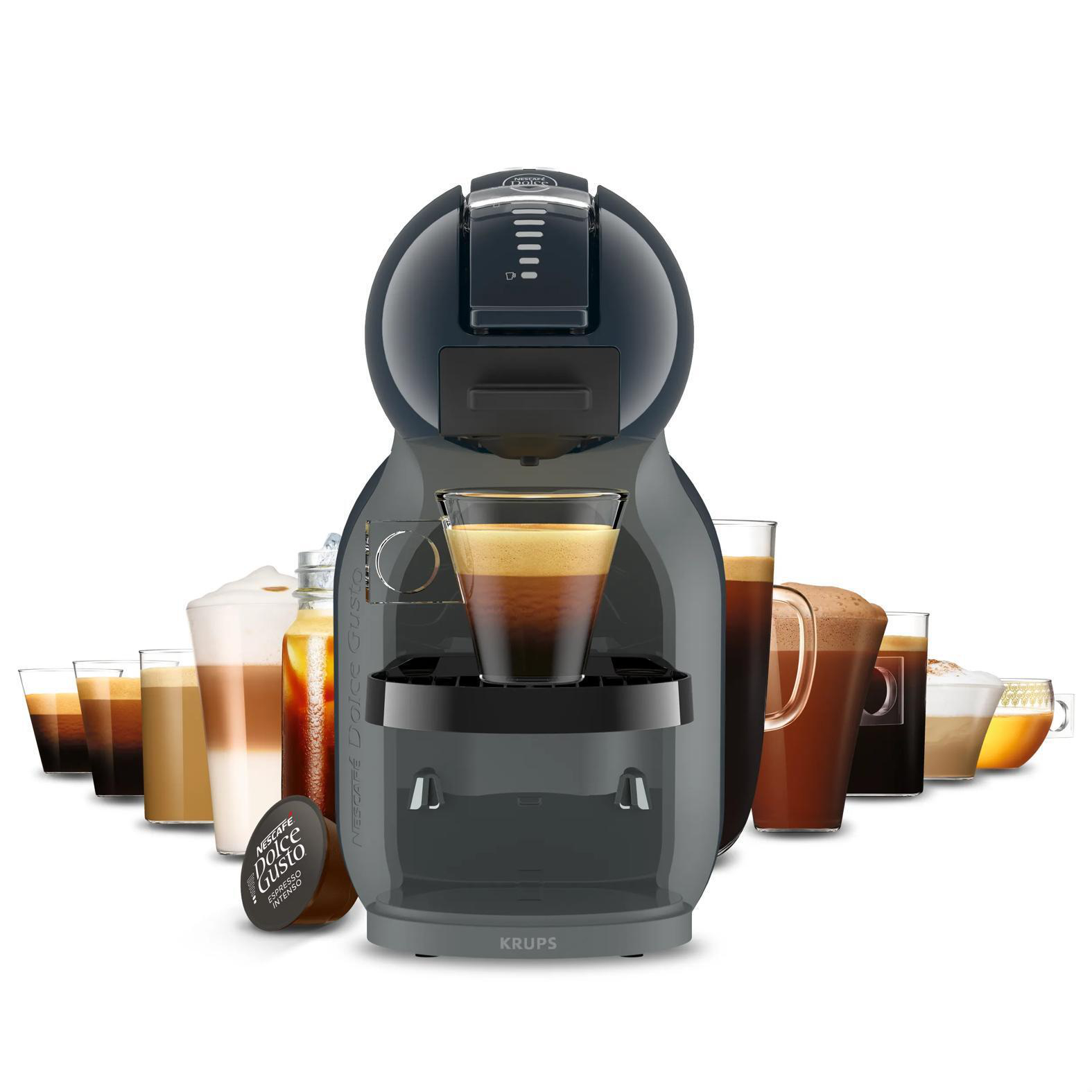 Eine dunkelgraue Kaffeemaschine mit einem Espresso-Glas und versch. Kaffeegetränken.