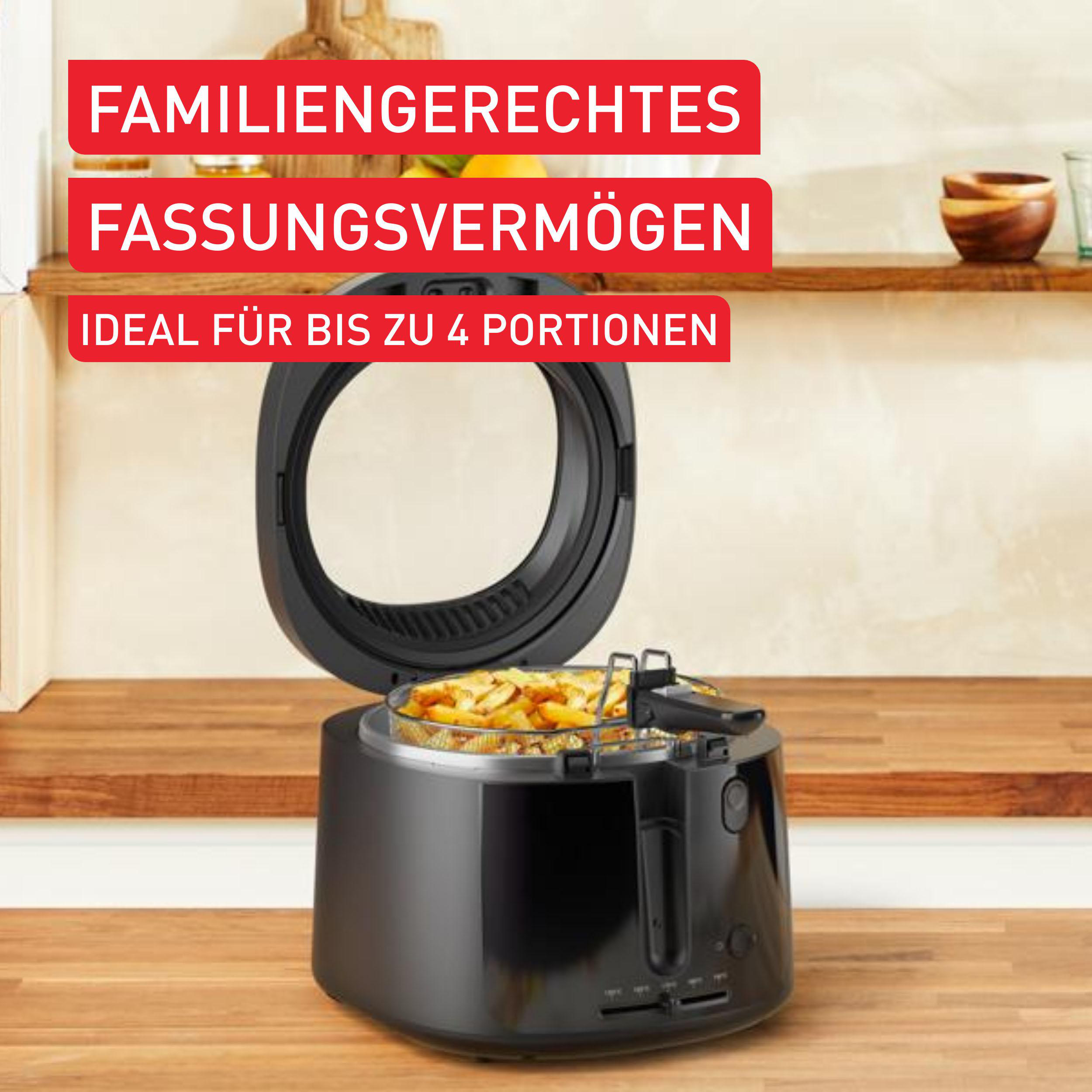 Eine offene schwarze Fritteuse mit Pommes Frites, ideal für bis zu 4 Portionen.