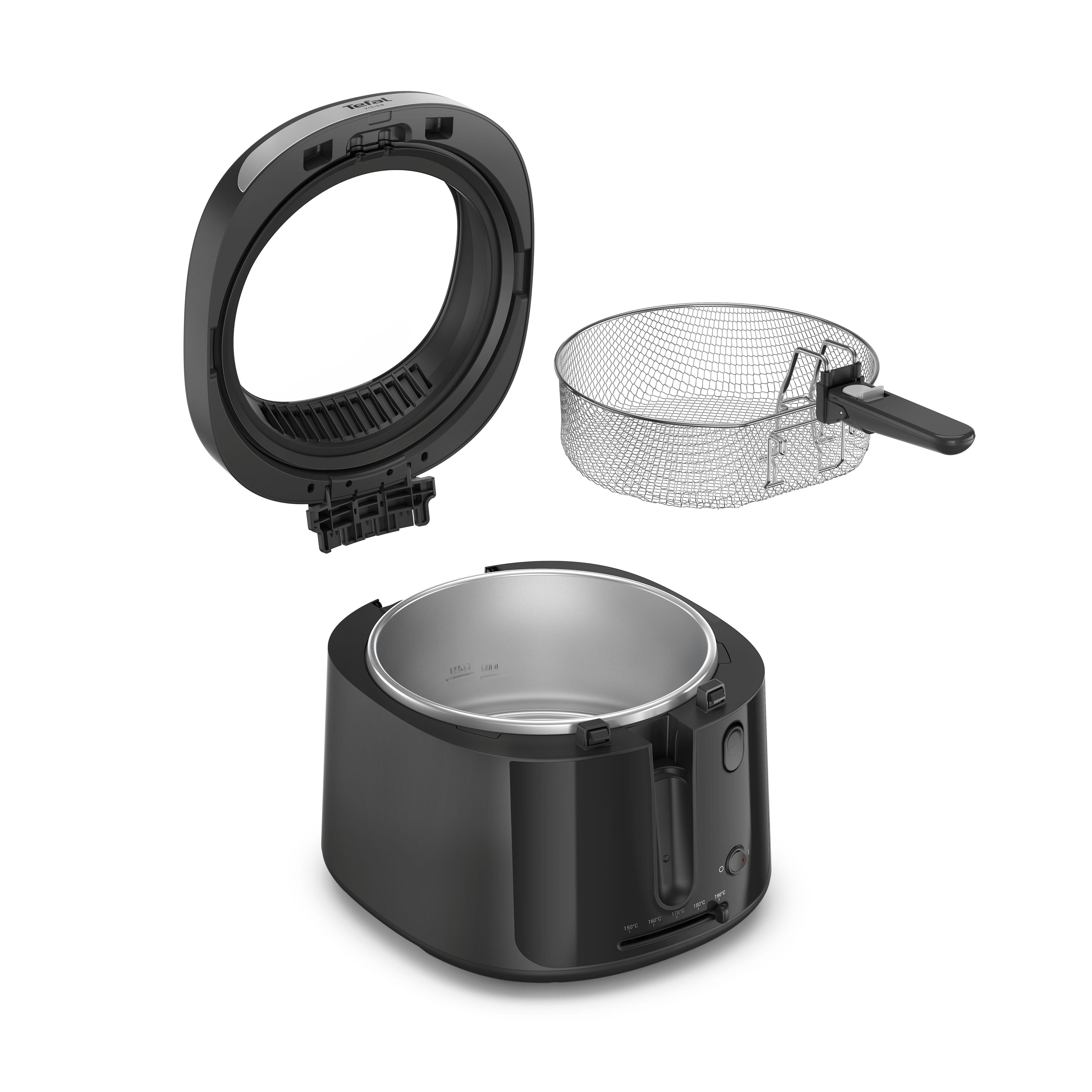 Ein schwarzer Tefal Heißluftfritteuse-Einsatz und ein Metallkorb.