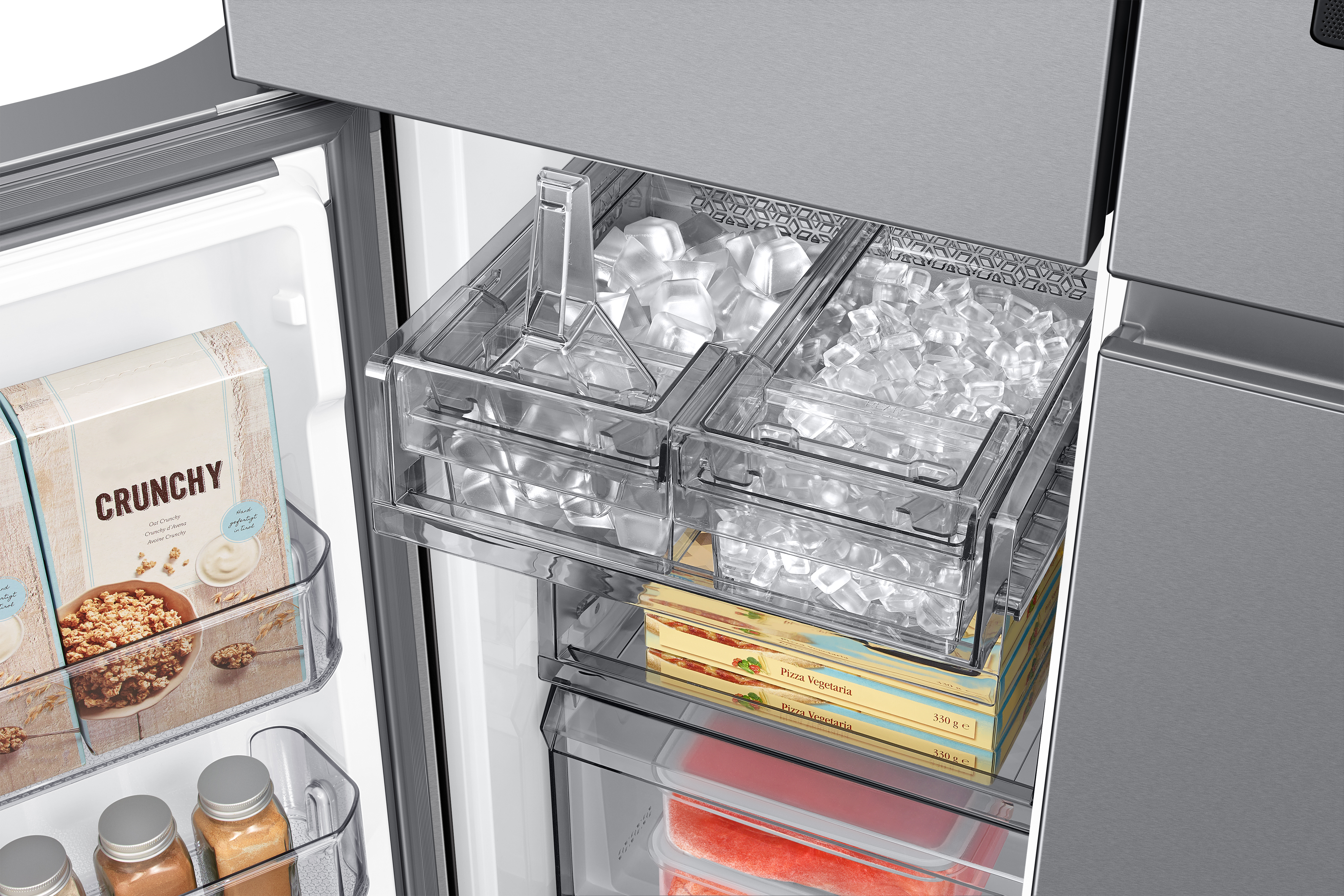 Cajón congelador con cubitos de hielo, pizzas y cajas de cereales en un refrigerador.