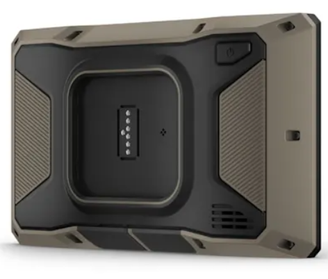 Tył wytrzymałego, beżowo-czarnego urządzenia ze złączami ładowania.