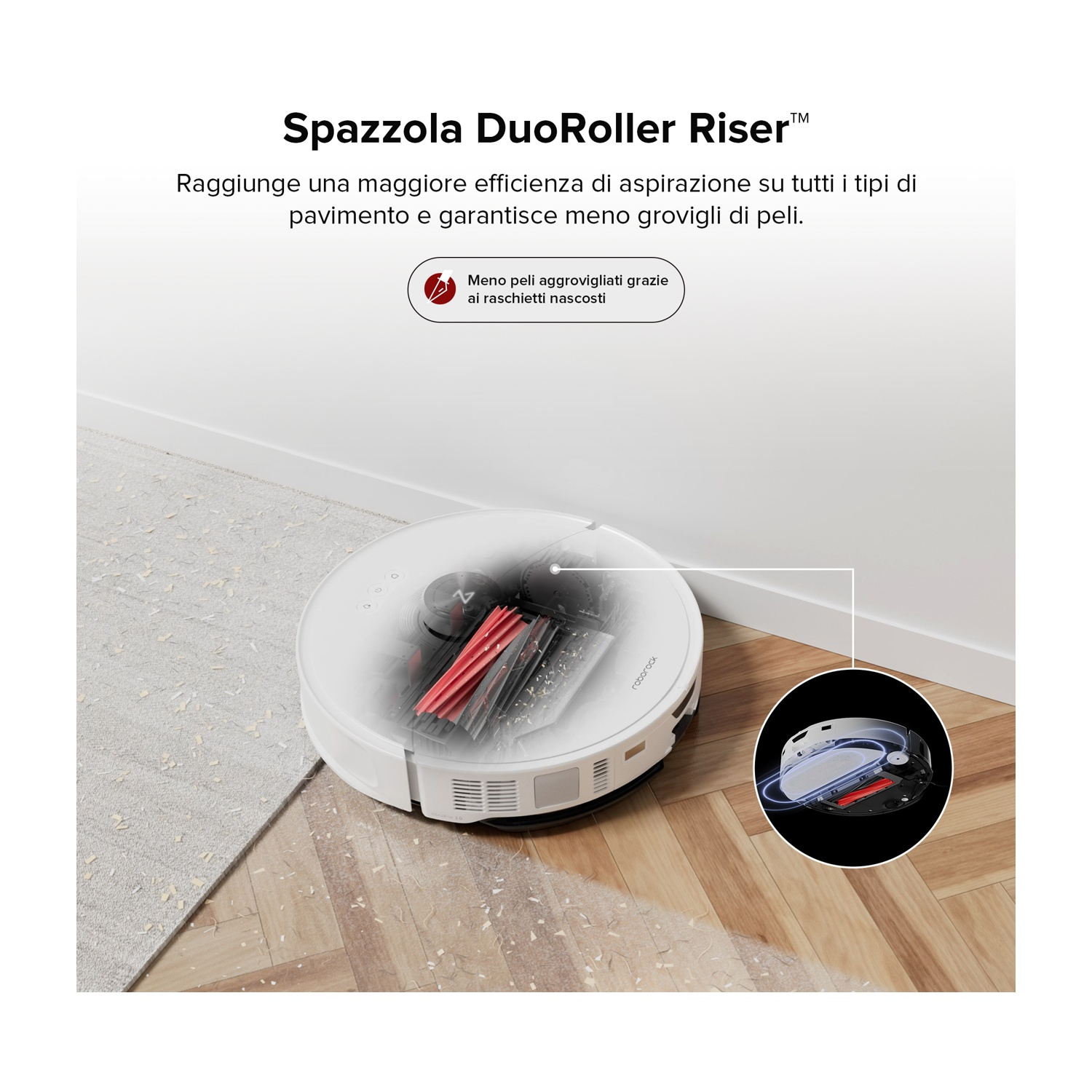 Un robot aspirapolvere bianco con spazzole rosse pulisce tappeto e parquet.