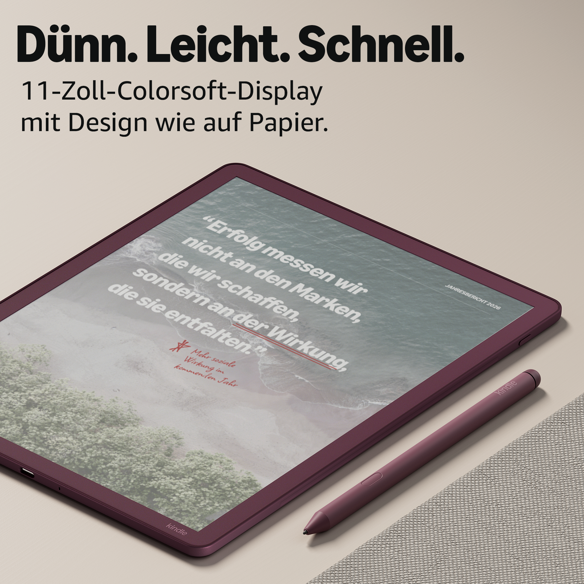 Ein lila Kindle mit Stift auf hellem Untergrund, Text auf dem Display.