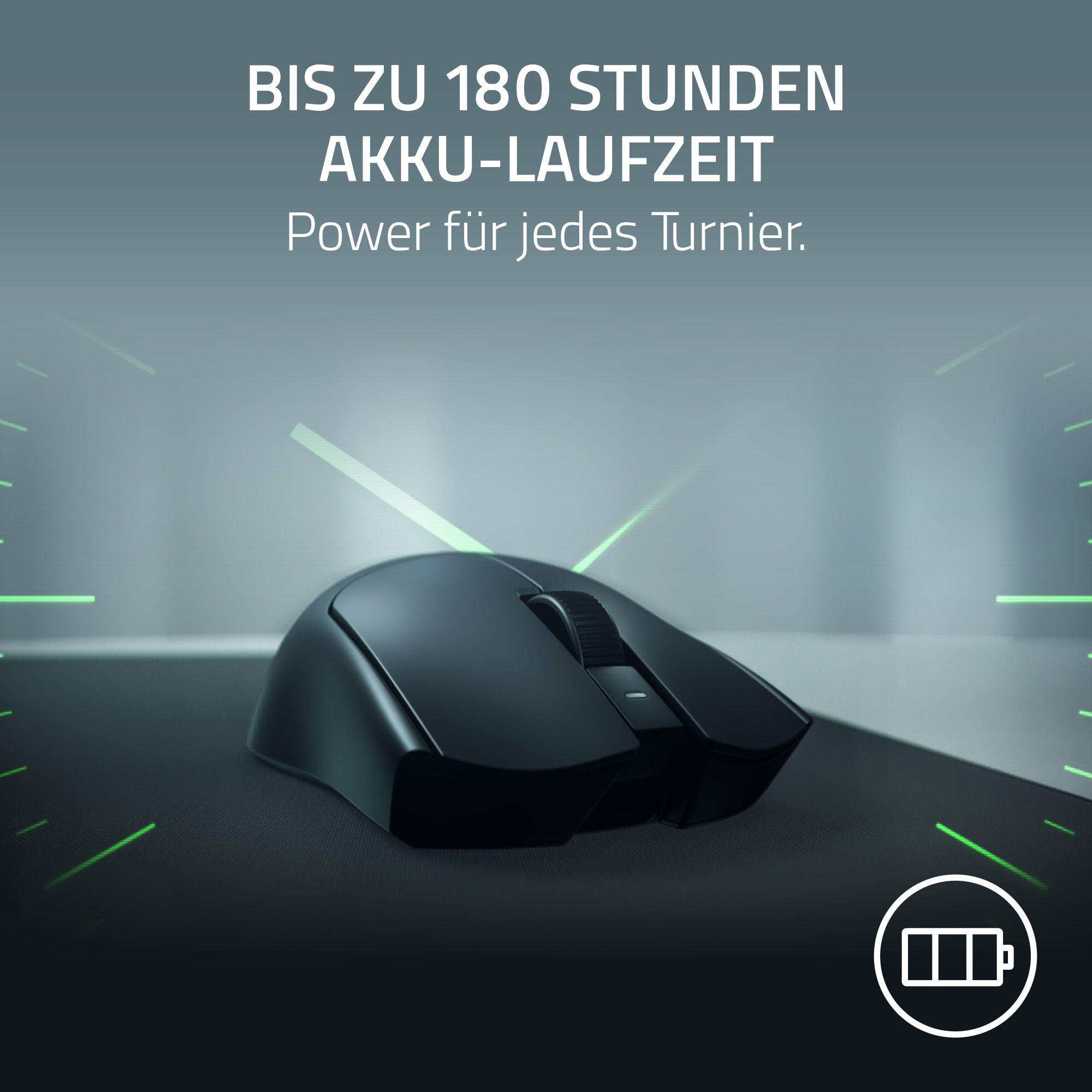 Schwarze kabellose Maus mit Scrollrad, auf schwarzer Matte, grüne Linien.