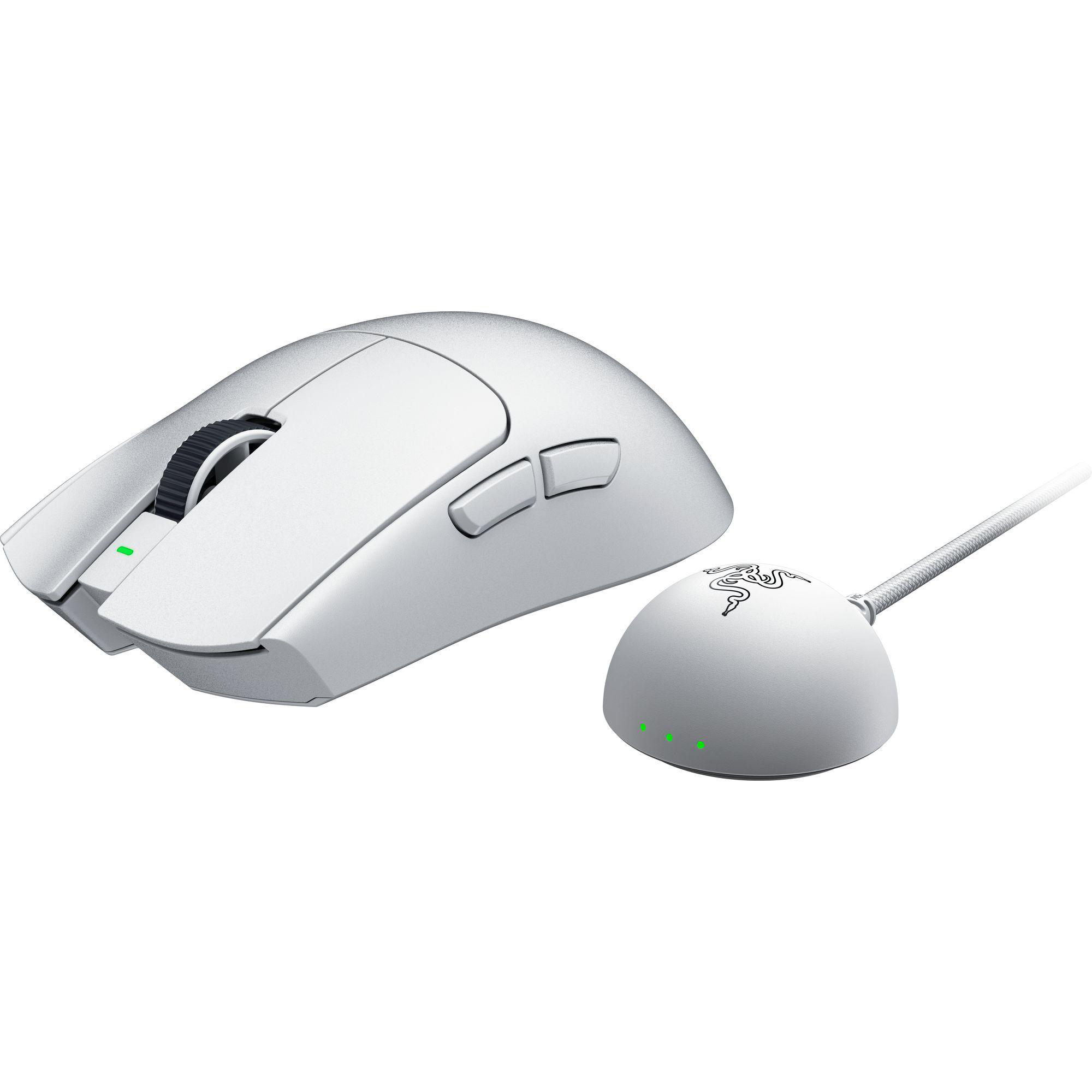 Eine weiße Gaming-Maus mit einer Ladeschale und grünen Ladeanzeigen.