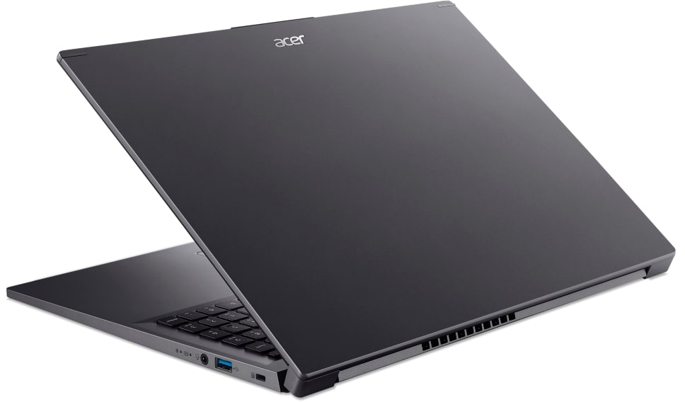 Egy sötét Acer laptop, nyitva, oldalról mutatva. Szellőzőnyílások láthatók.