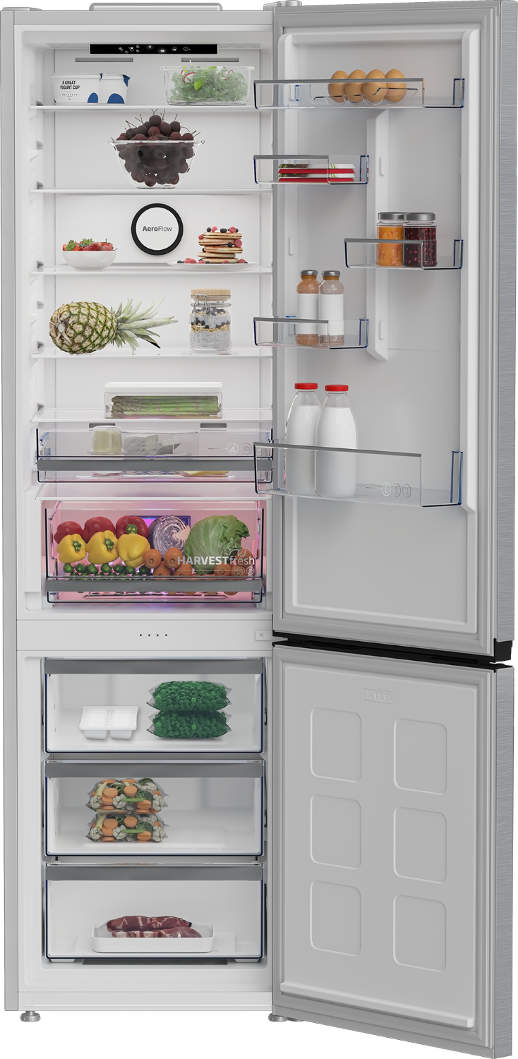 Refrigerador abierto con estantes llenos de frutas, verduras, huevos, lácteos y frascos.