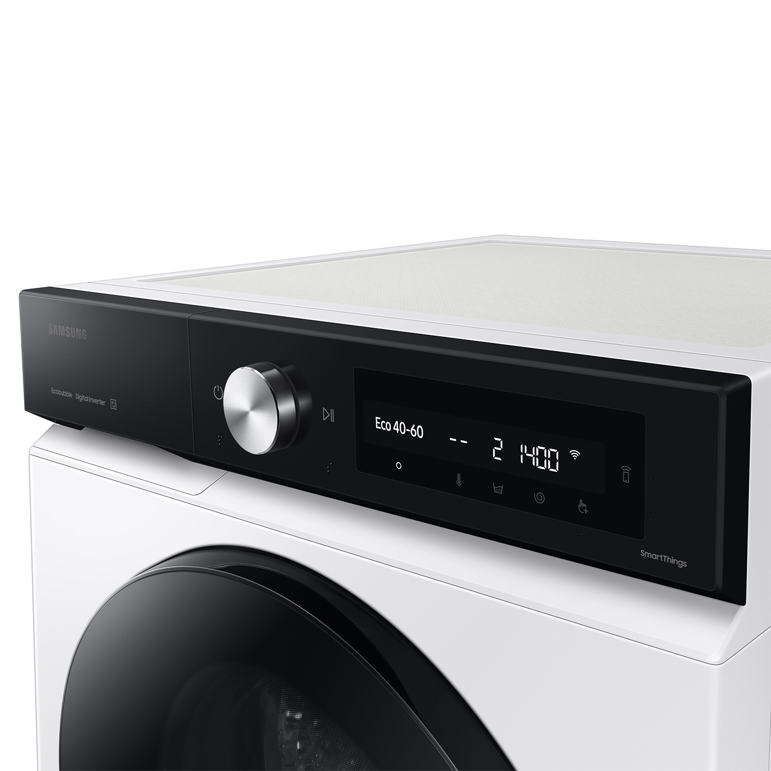 Primer plano de una lavadora Samsung moderna con panel de control negro y dial plateado.