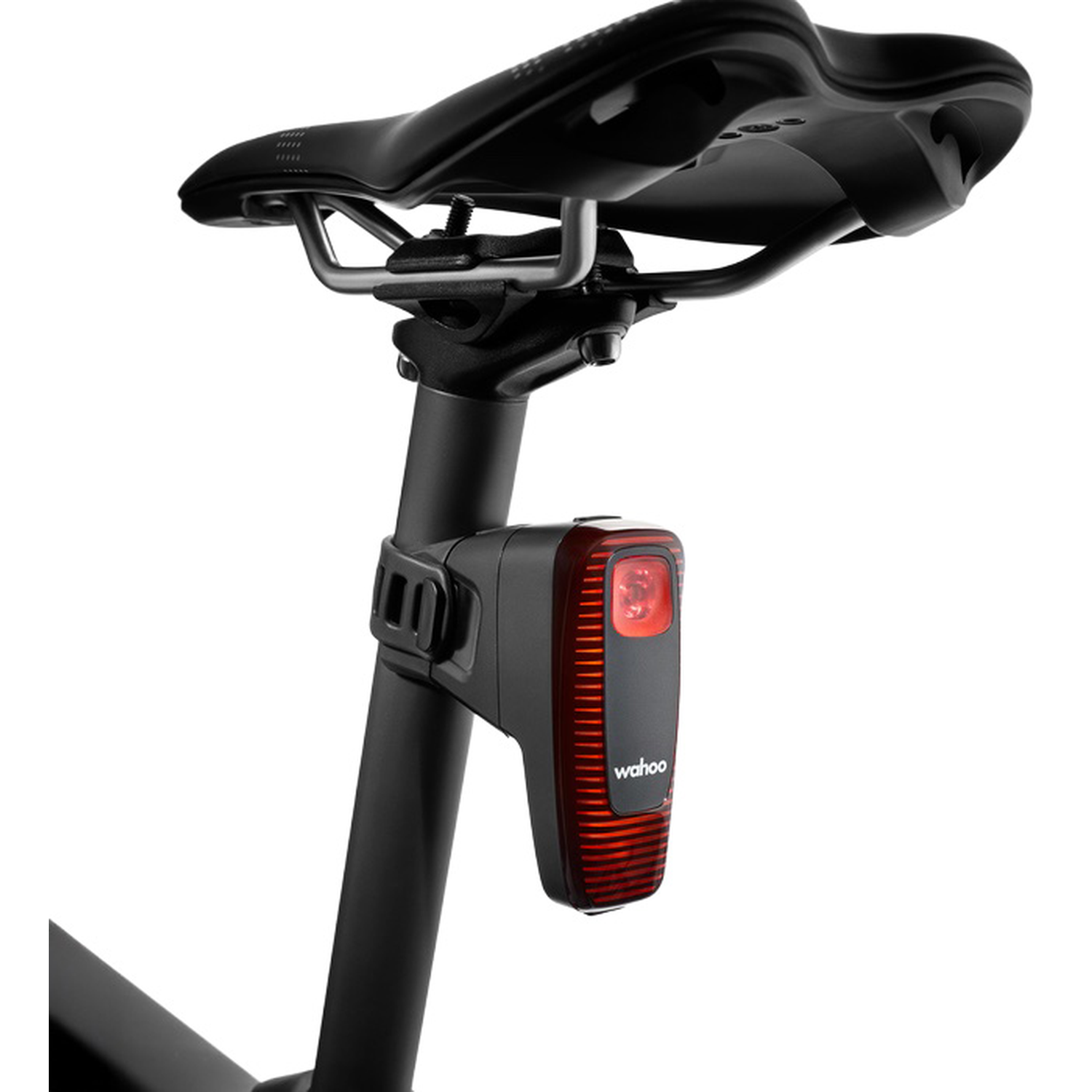 Close-up van een zwarte fietszadelpen met een Wahoo achterlicht.