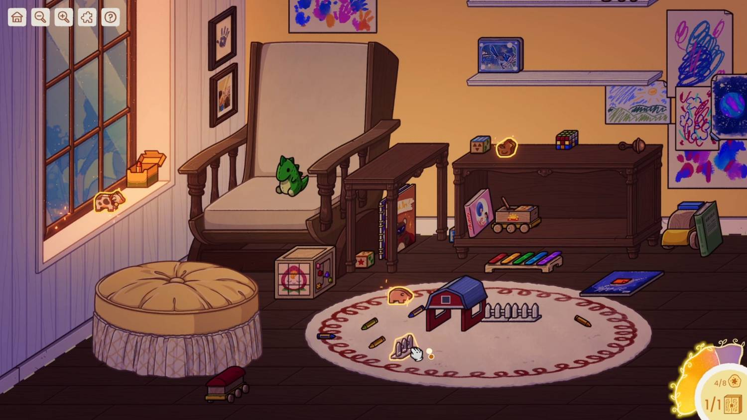 Una sala de juegos con un sillón grande, juguetes y dibujos infantiles.