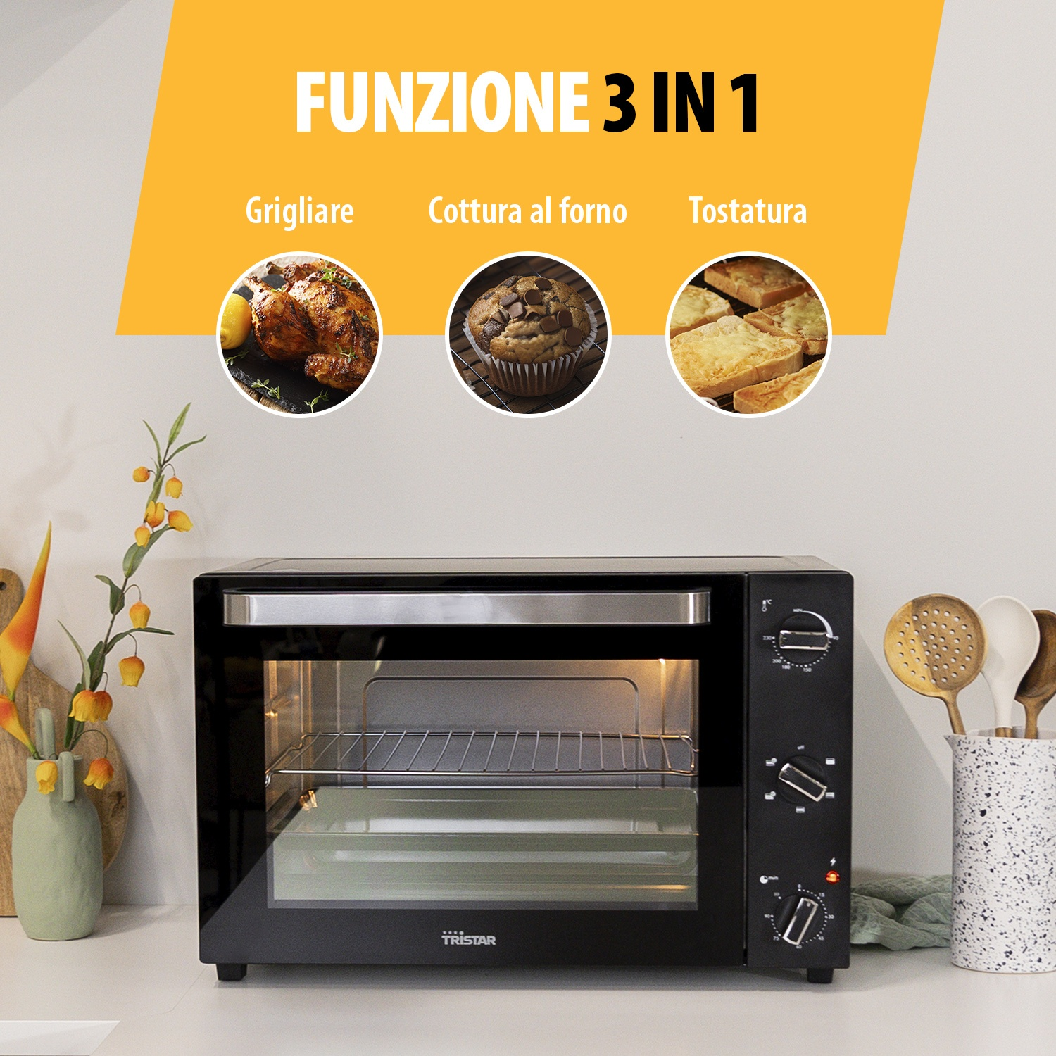 Un forno da banco nero con tre immagini circolari che mostrano pollo arrosto, muffin e toast.