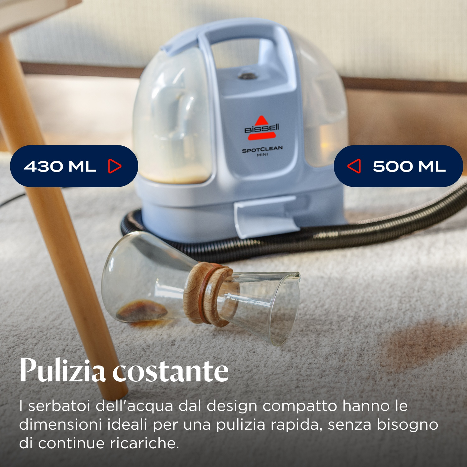 Un pulitore Bissell SpotClean Mini con serbatoi da 430 ml e 500 ml.