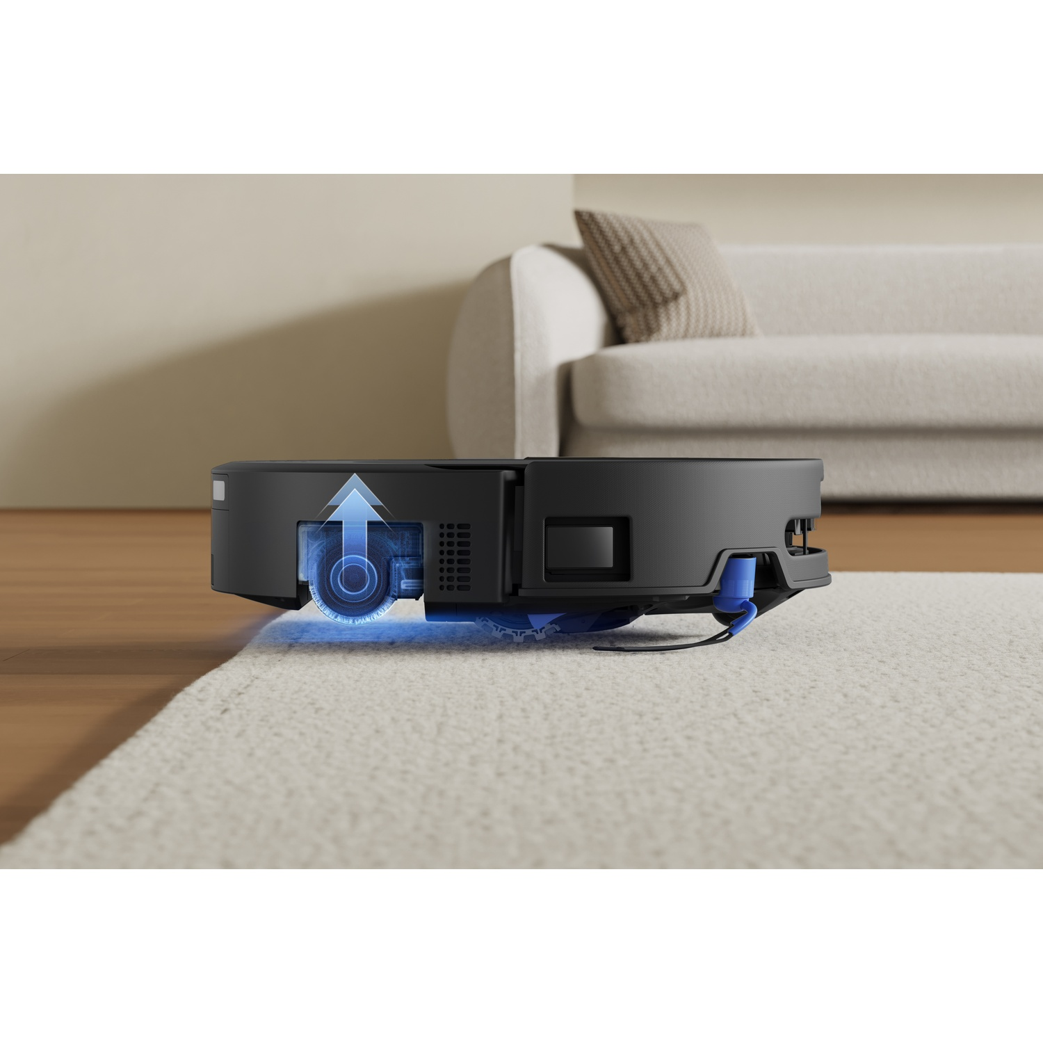 Un robot aspirapolvere nero con indicatore blu si muove su un tappeto chiaro.