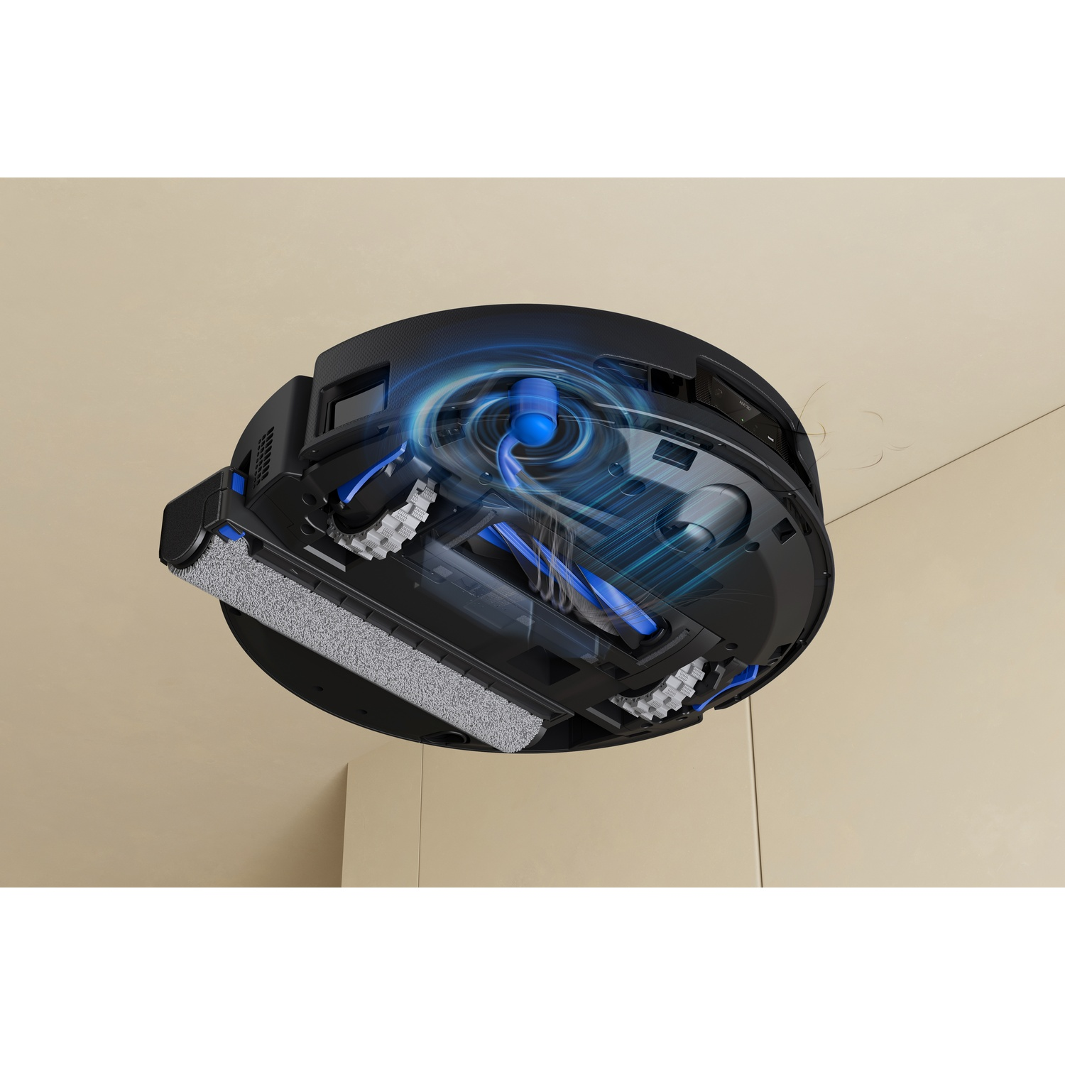 Un robot aspirapolvere nero con accenti blu, che aspira polvere.