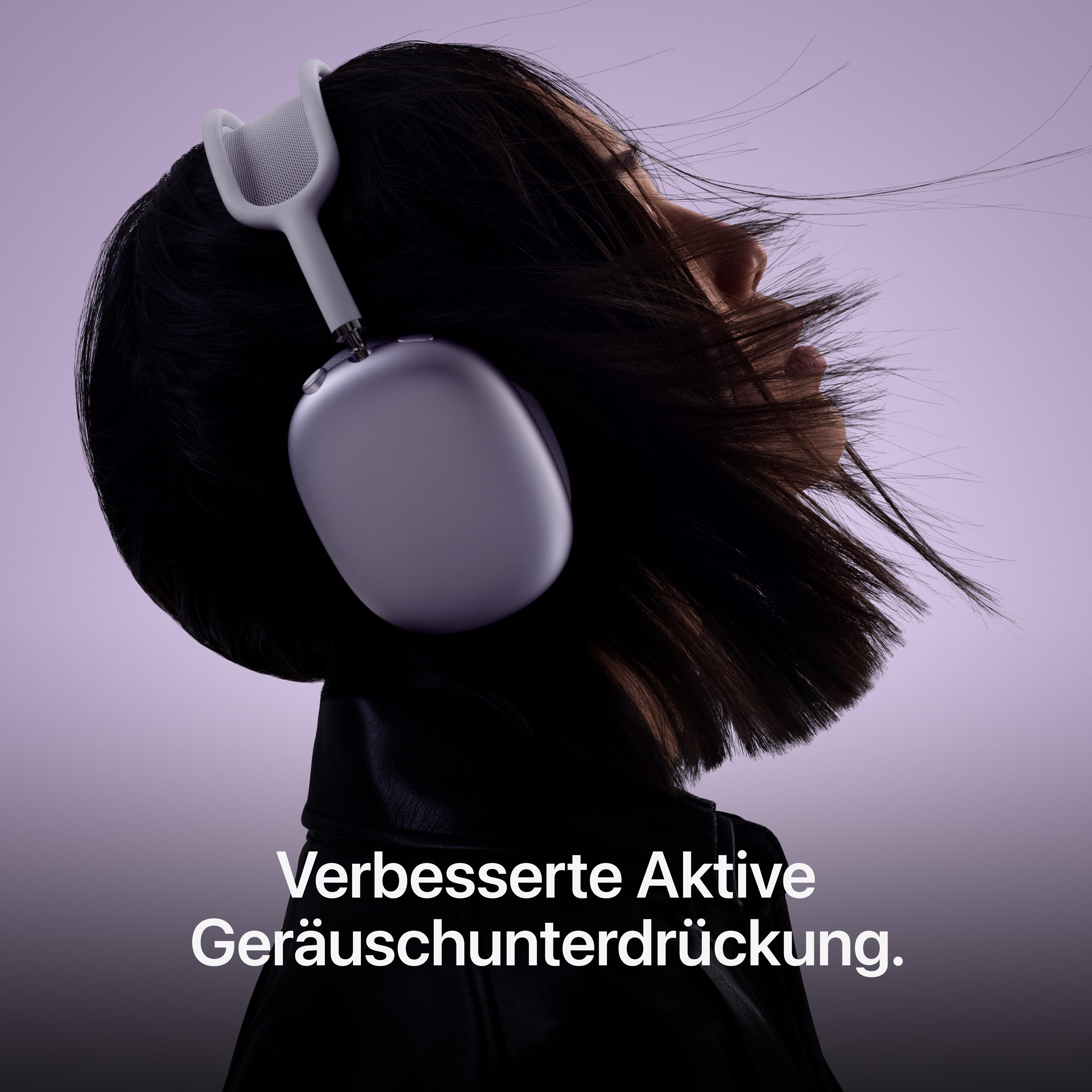 Person mit Kopfhörern vor lila Hintergrund, Text: Verbesserte Aktive Geräuschunterdrückung.