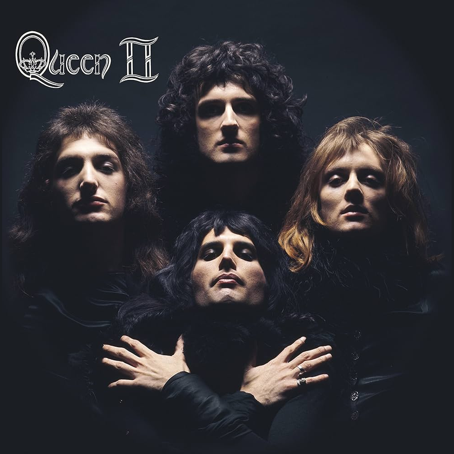 Queen II Album cover: Four band members against a dark background, title top left.