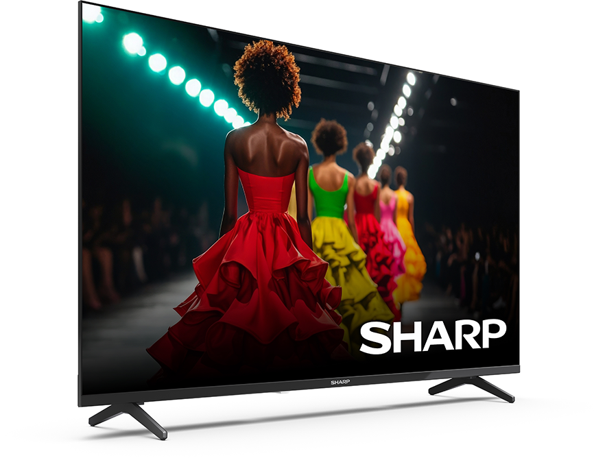 Egy Sharp TV színes ruhás nőket bemutató divatbemutatót jelenít meg.