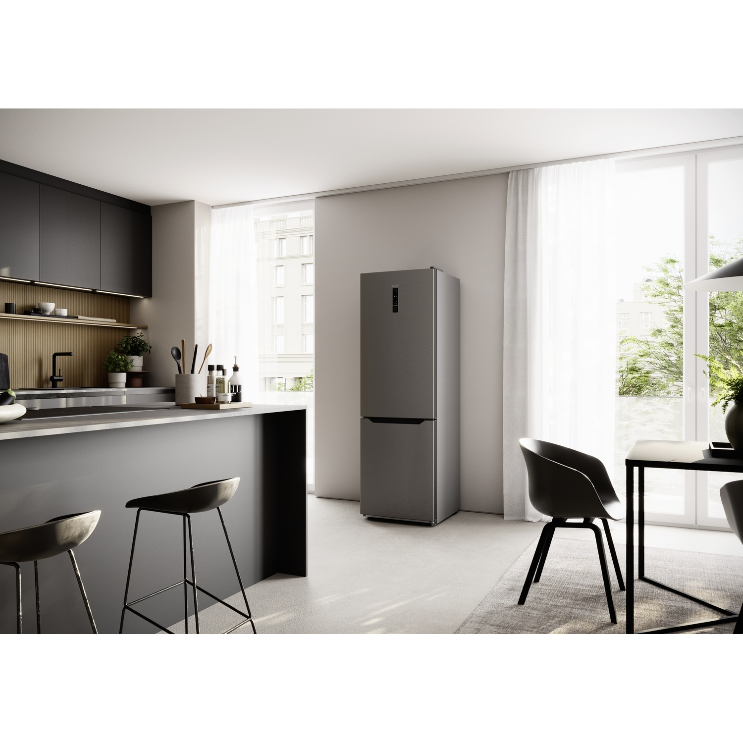 Cucina moderna con pensili grigi, isola, sgabelli e frigorifero argentato.