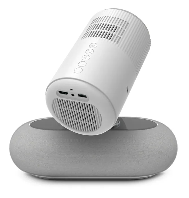 Biały oczyszczacz powietrza spoczywa na szarej, owalnej podstawie.