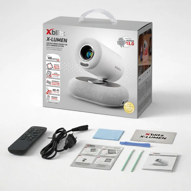 Zestaw projektora Xblitz X-Lumen z pilotem, kablami i instrukcjami.